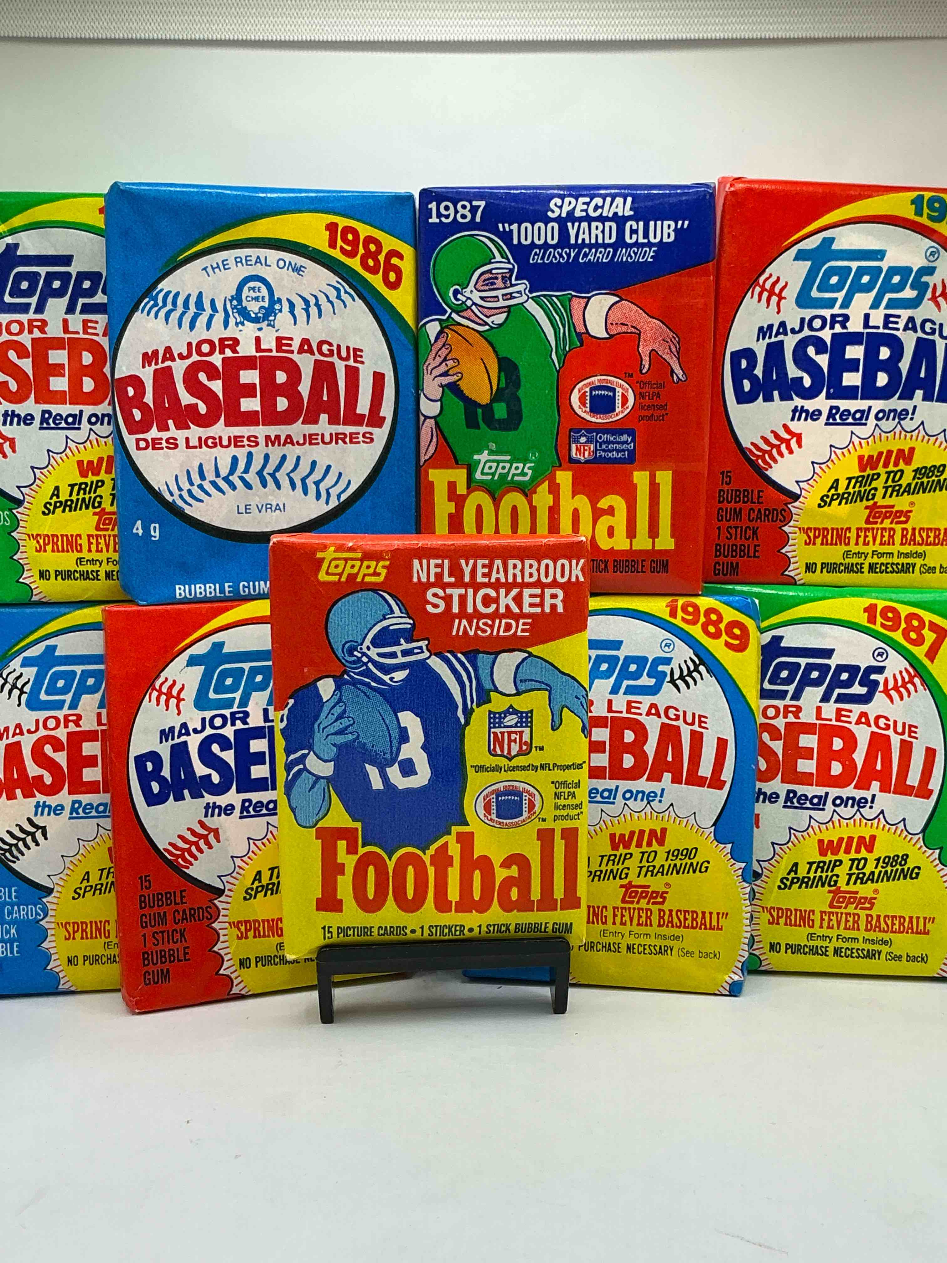 80’s Sports Fans! The Perfect Christmas Gift! This Rare Collection Of 80’s Wax Packs Are Perfect For Any Sports Fans! Baseball & Football Packs! Including The Ultra Rare 1985 & 1987 Football Wax Packs… Which Could Have Some INSANE Cards Inside! 80’s Baseball & Football!