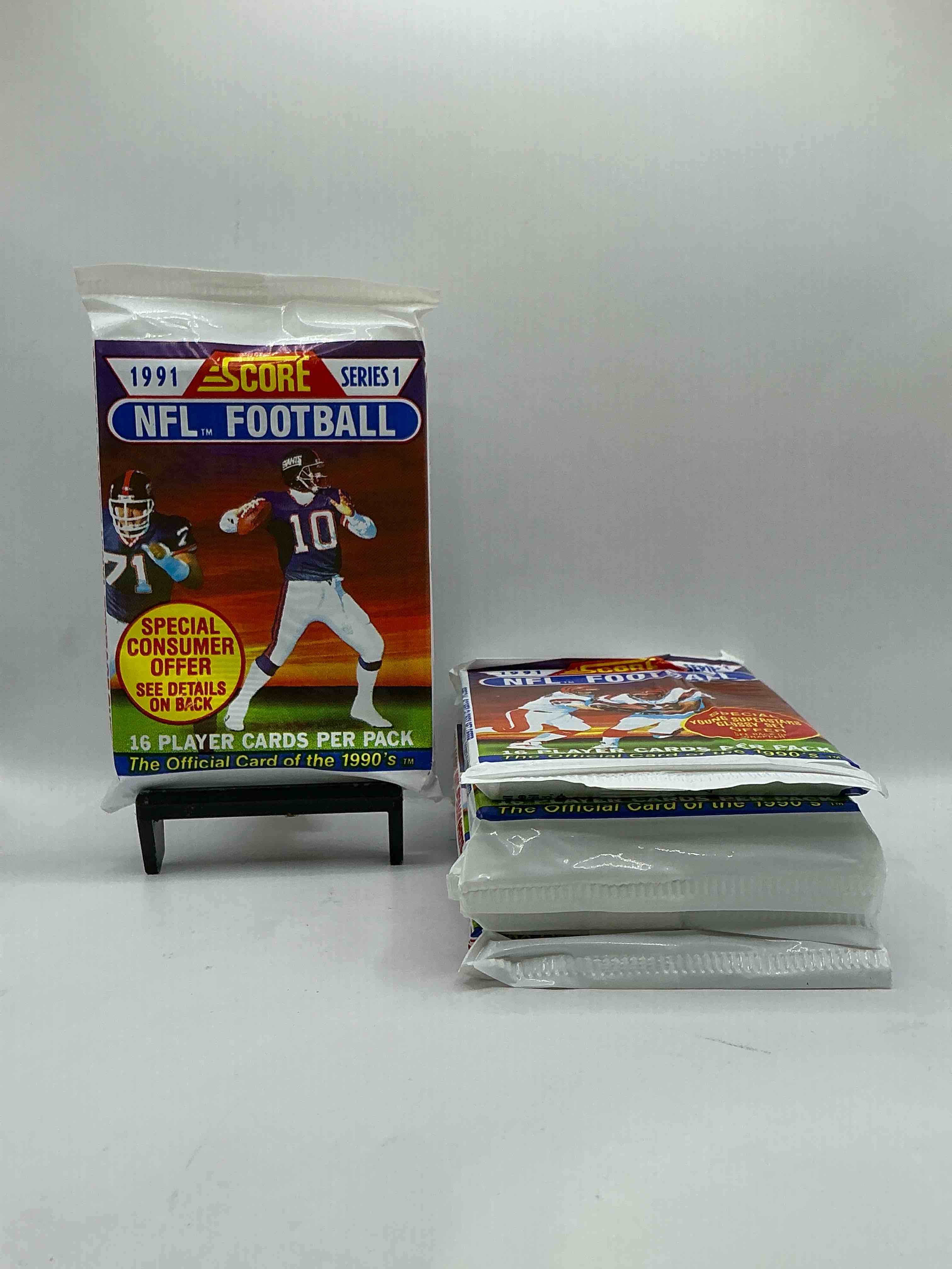 1991 NFL Score Football Sealed Card Pack, Direct From Original Retail Case! These Cards Are Sought After By Collectors For Their Awesome, Nostalgic Look. Search For Brett Favre Rookie, Early Jerry Rice, Early Emmit Smith, Joe Montana & So Much More!
