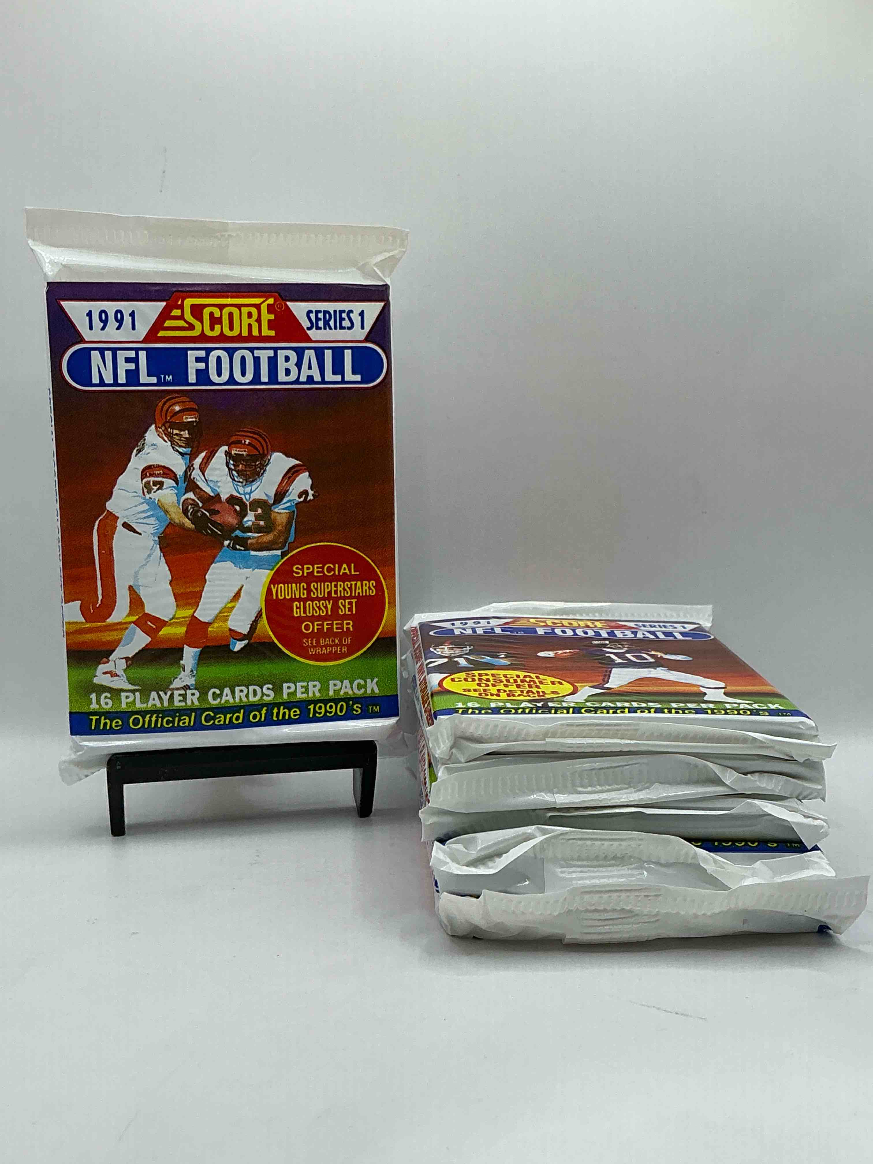 1991 NFL Score Football Sealed Card Pack, Direct From Original Retail Case! These Cards Are Sought After By Collectors For Their Awesome, Nostalgic Look. Search For Brett Favre Rookie, Early Jerry Rice, Early Emmit Smith, Joe Montana & So Much More!