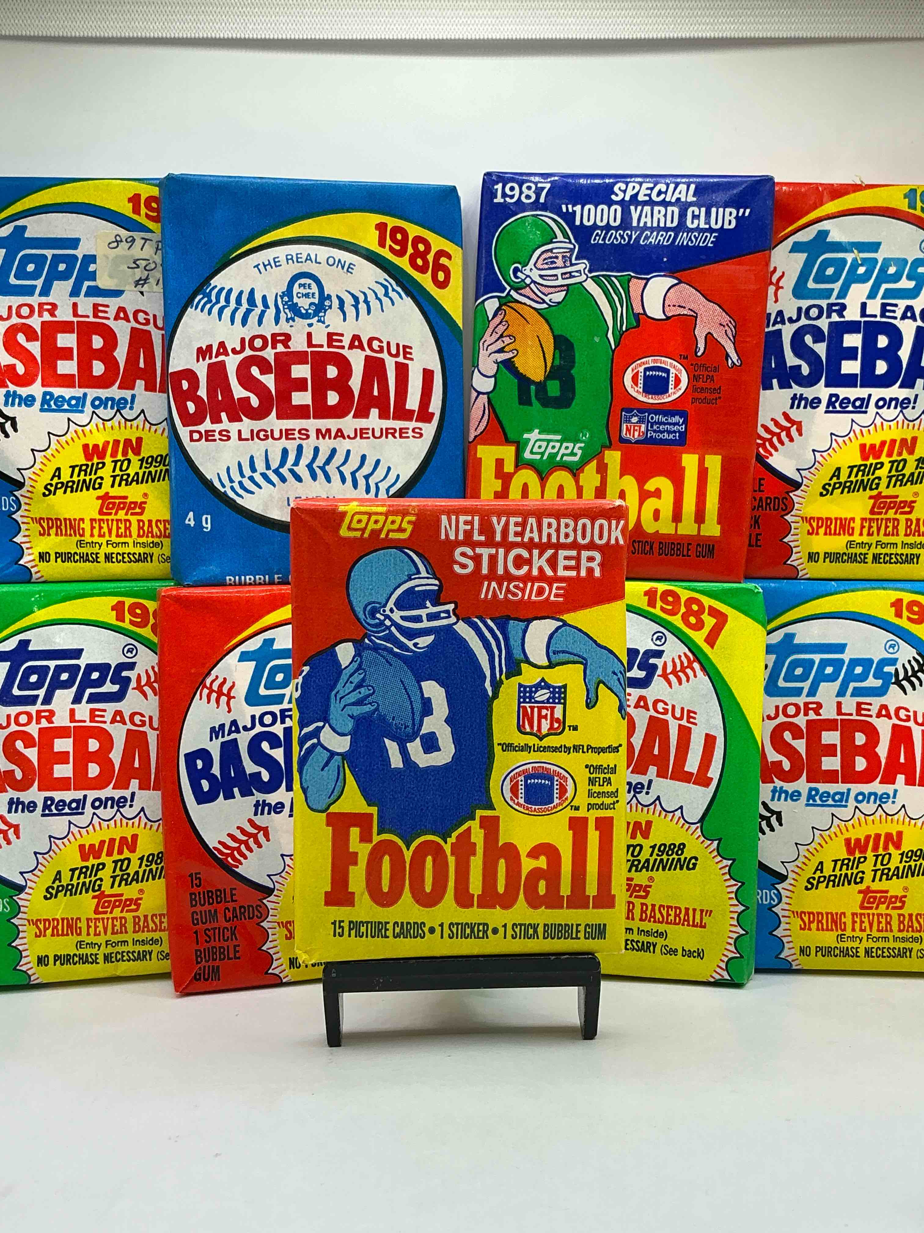 1985 Football! WHAT!? 80’s Sports Fans! The Perfect Christmas Gift! This Rare Collection Of 80’s Wax Packs Are Perfect For Any Sports Fans! Baseball & Football Packs! Including The Ultra Rare 1985 & 1987 Football Wax Packs… Which Could Have Some INSANE Cards Inside! 80’s Baseball & Football!