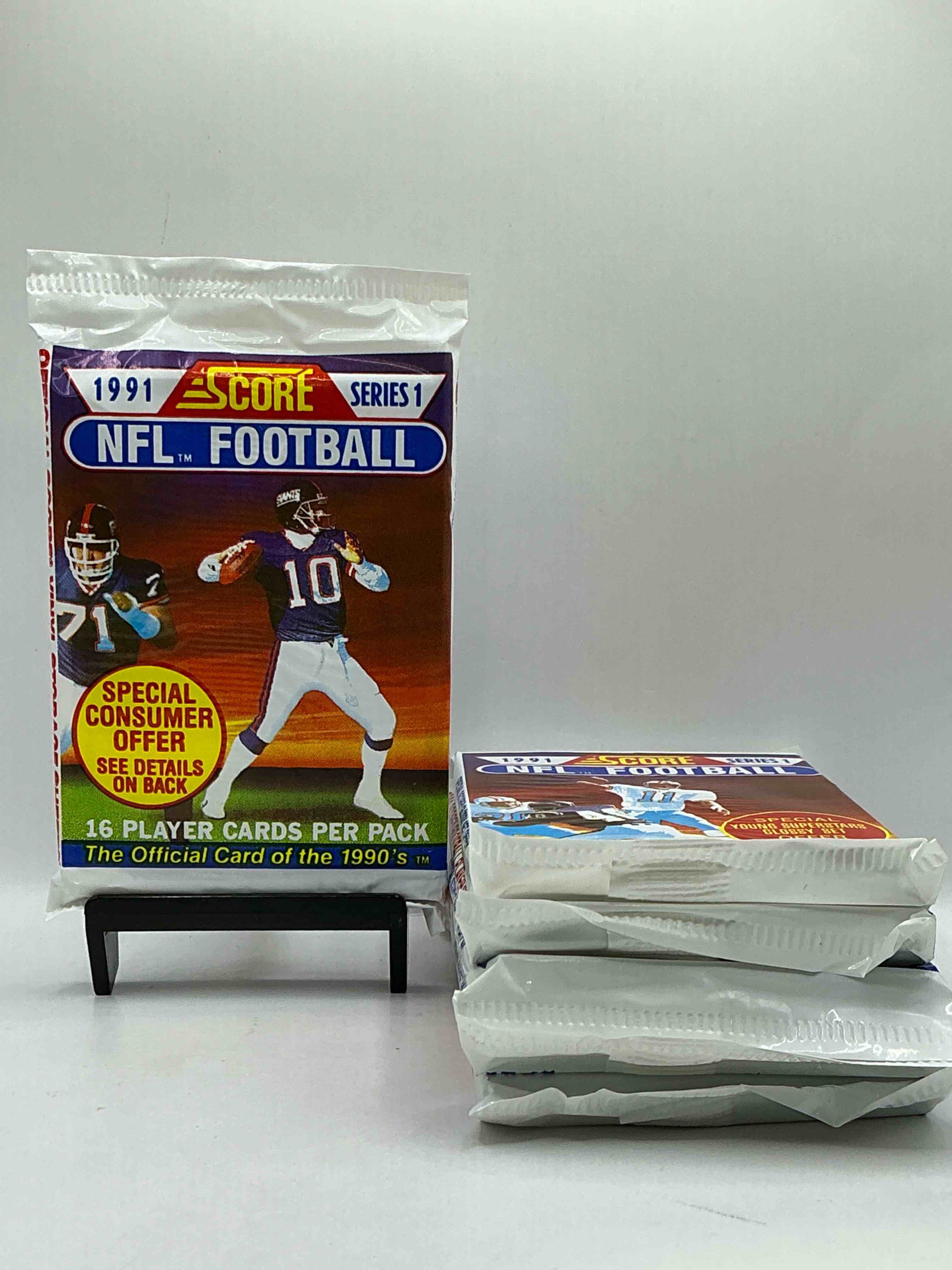 1991 NFL Score Football Sealed Card Pack, Direct From Original Retail Case! These Cards Are Sought After By Collectors For Their Awesome, Nostalgic Look. Search For Brett Favre Rookie, Early Jerry Rice, Early Emmit Smith, Joe Montana & So Much More!