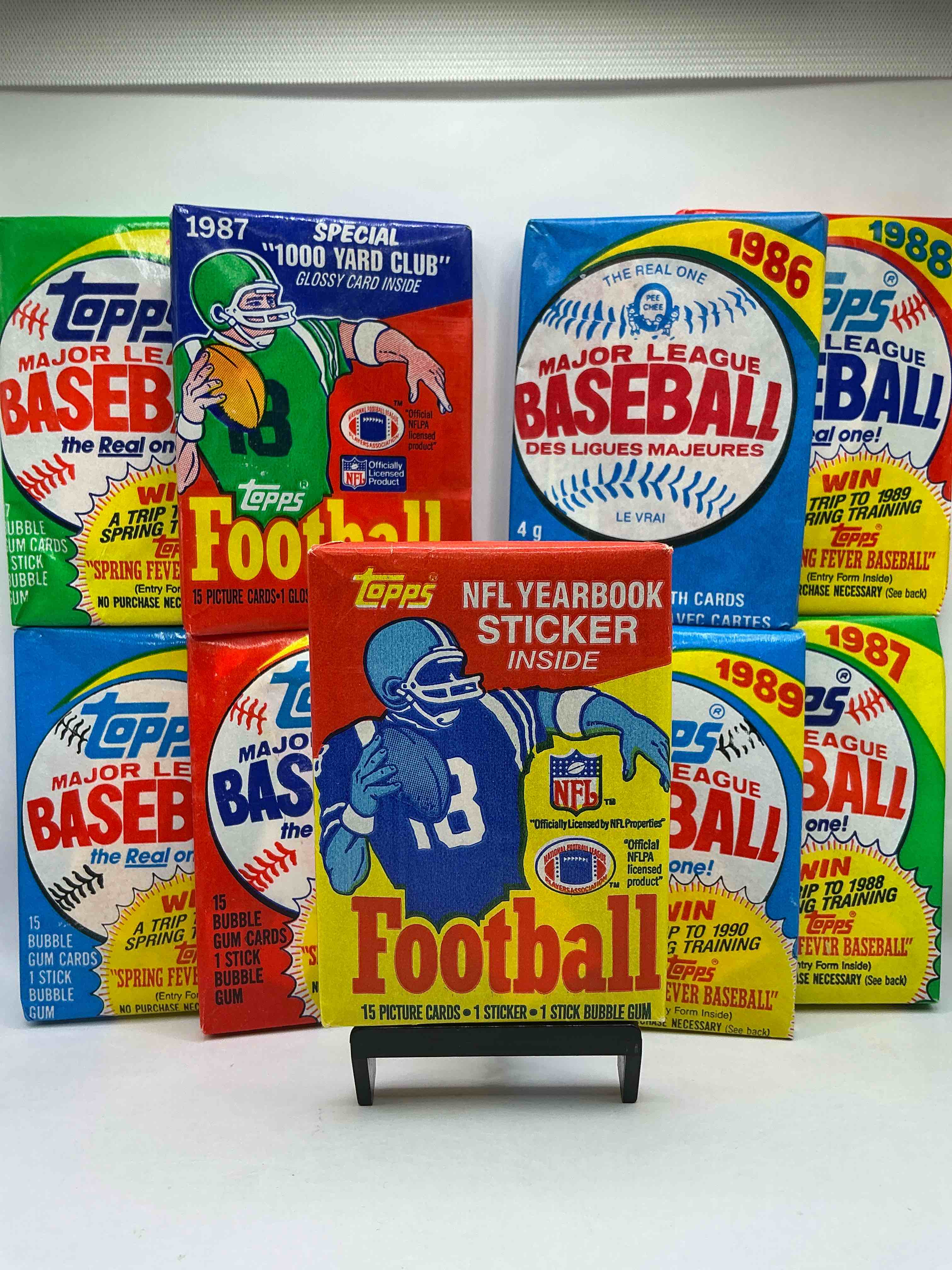 1985 Football! WHAT!? 80’s Sports Fans! The Perfect Christmas Gift! This Rare Collection Of 80’s Wax Packs Are Perfect For Any Sports Fans! Baseball & Football Packs! Including The Ultra Rare 1985 & 1987 Football Wax Packs… Which Could Have Some INSANE Cards Inside! 80’s Baseball & Football!