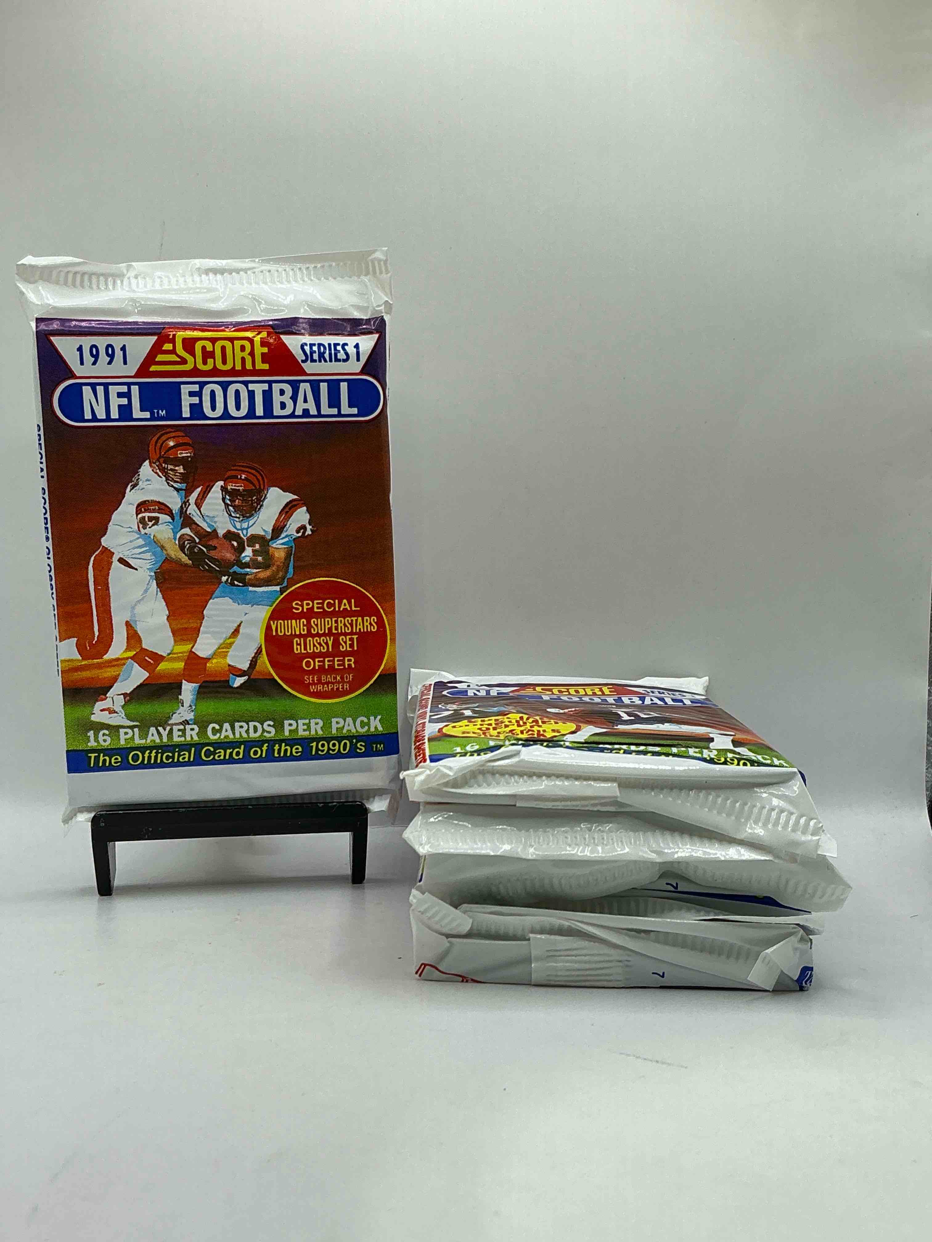 1991 NFL Score Football Sealed Card Pack, Direct From Original Retail Case! These Cards Are Sought After By Collectors For Their Awesome, Nostalgic Look. Search For Brett Favre Rookie, Early Jerry Rice, Early Emmit Smith, Joe Montana & So Much More!