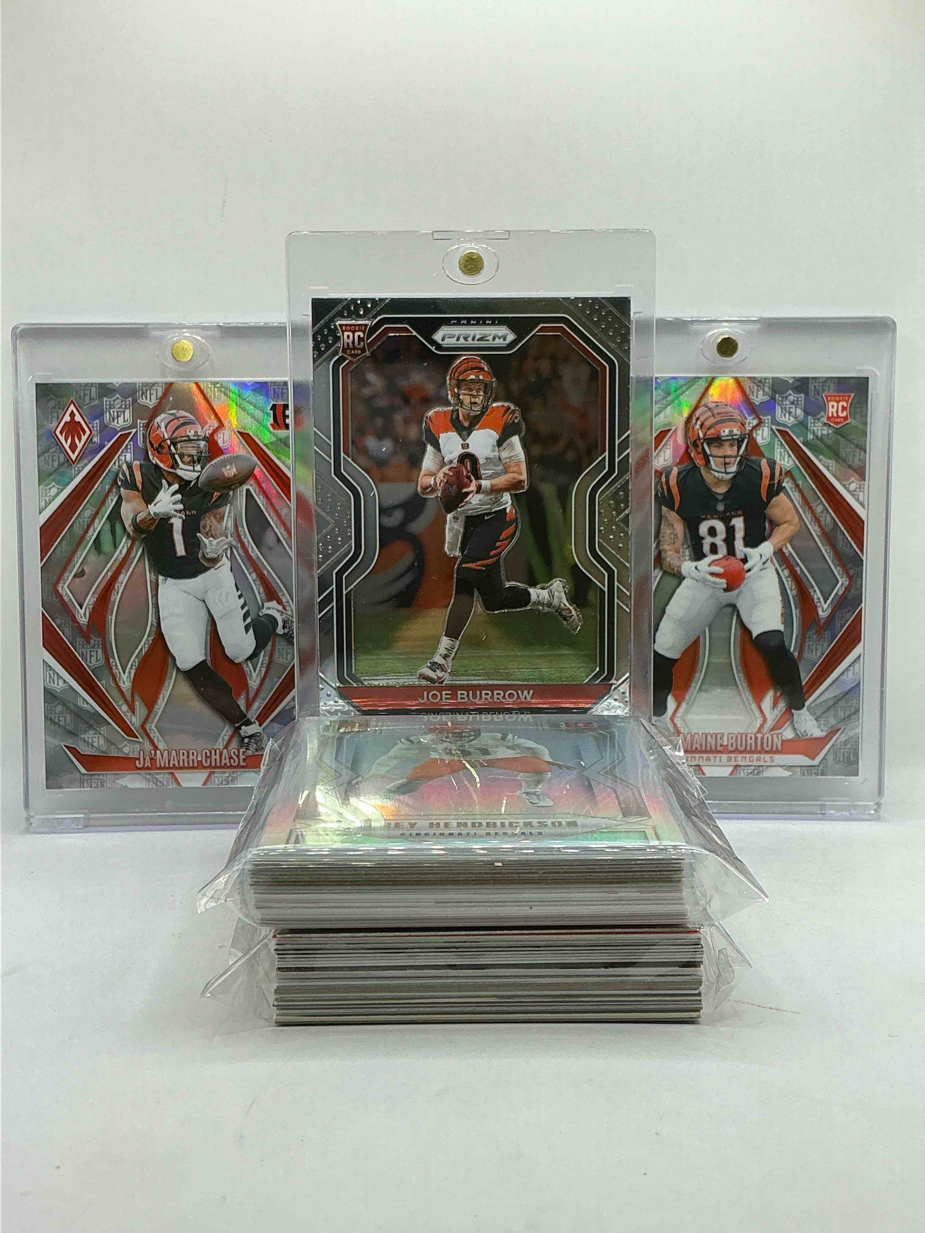 Joe Burrow Prizm Rookie Card! WOW! Matching Ultra Rare Phoenix NFL Logo Prizm /150 Ja’marr Chase & Jermaine Burton! Crazy Combo! This 50 Card Bengals Lot Includes Legends, Rookies, Heroes, Commons, Vintage & New Cards & More!
