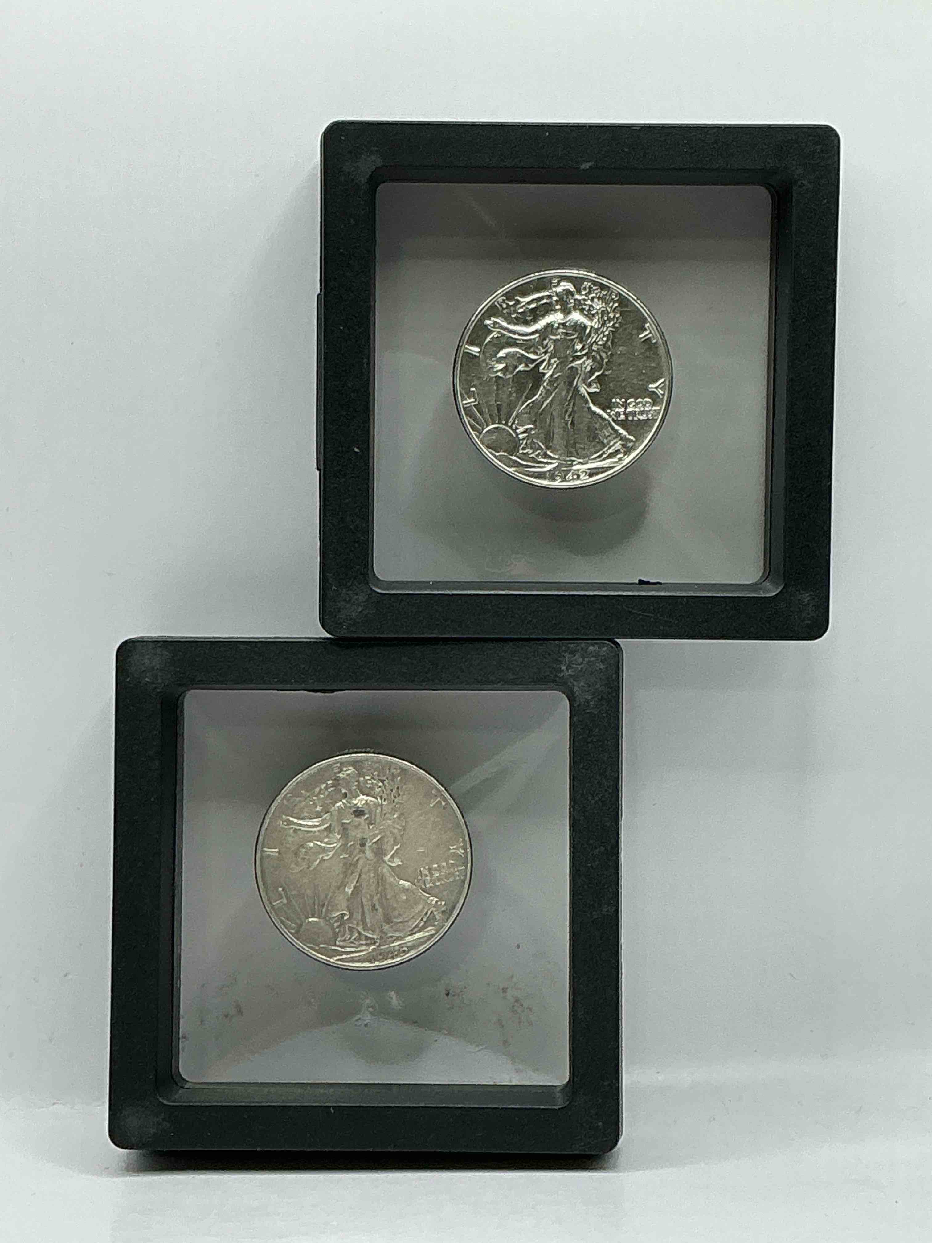 World War II Silver! Antique U.S. Silver! Liberty Walking Silver Fine U.S. Silver Half Dollar! This Striking Half Dollars Were Minted From 1916-1947 & Have Become Some Of The Most Collectible Coins In History! Here Is A Striking Circulated Example From 1942 & 1945! Appears Uncirculated! Liberty Walking Coins Are 90% Fine U.S. Silver, A Great Investment In Precious Metal!