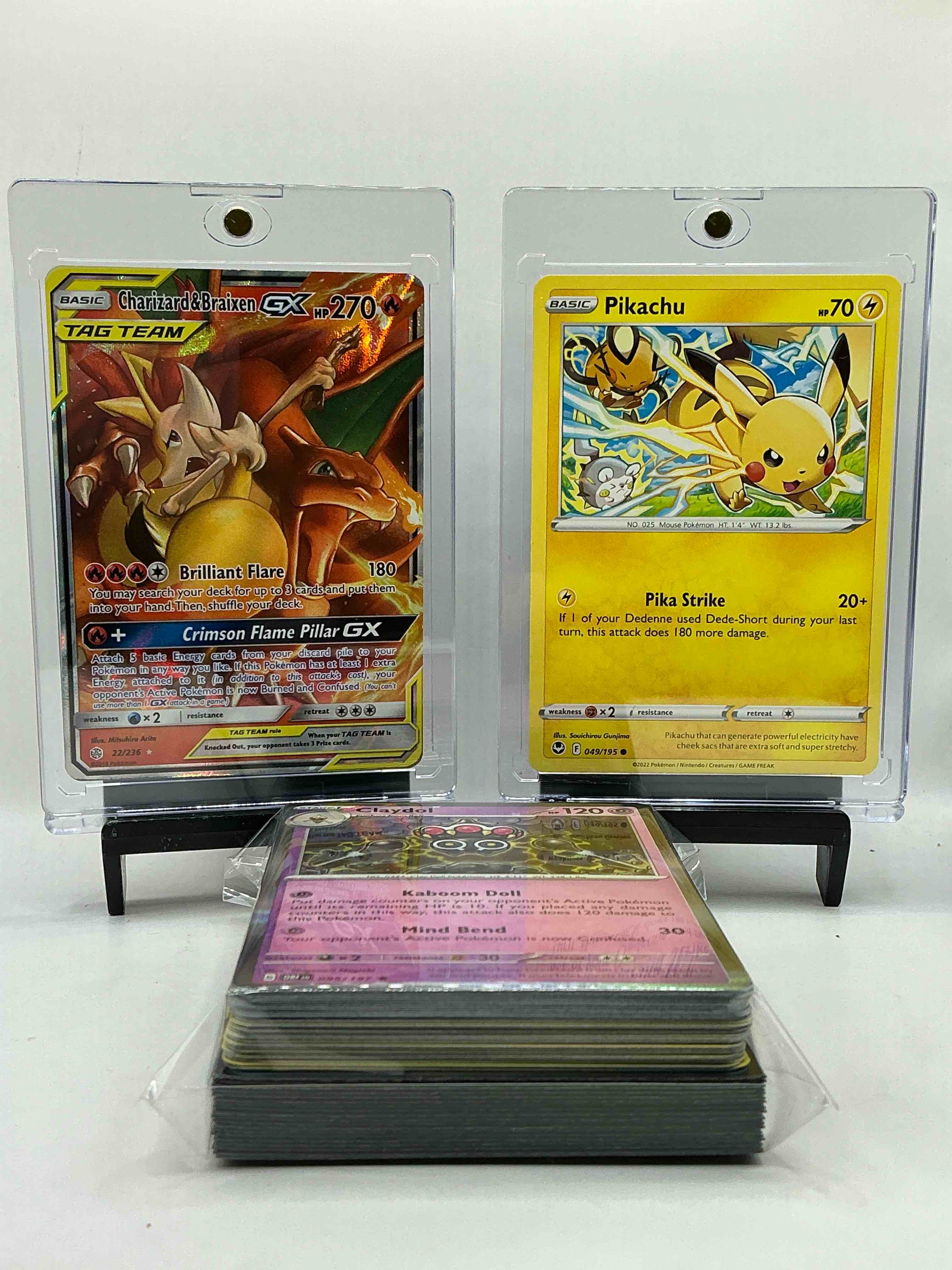 Ultra Rare Charizard X Braixen Combo Card! TAG TEAM HOLO! Charizard & Pikachu… The Two BIGGEST Pokemon! This 50 Card Lot Includes Holos, Legends, Commons & More!