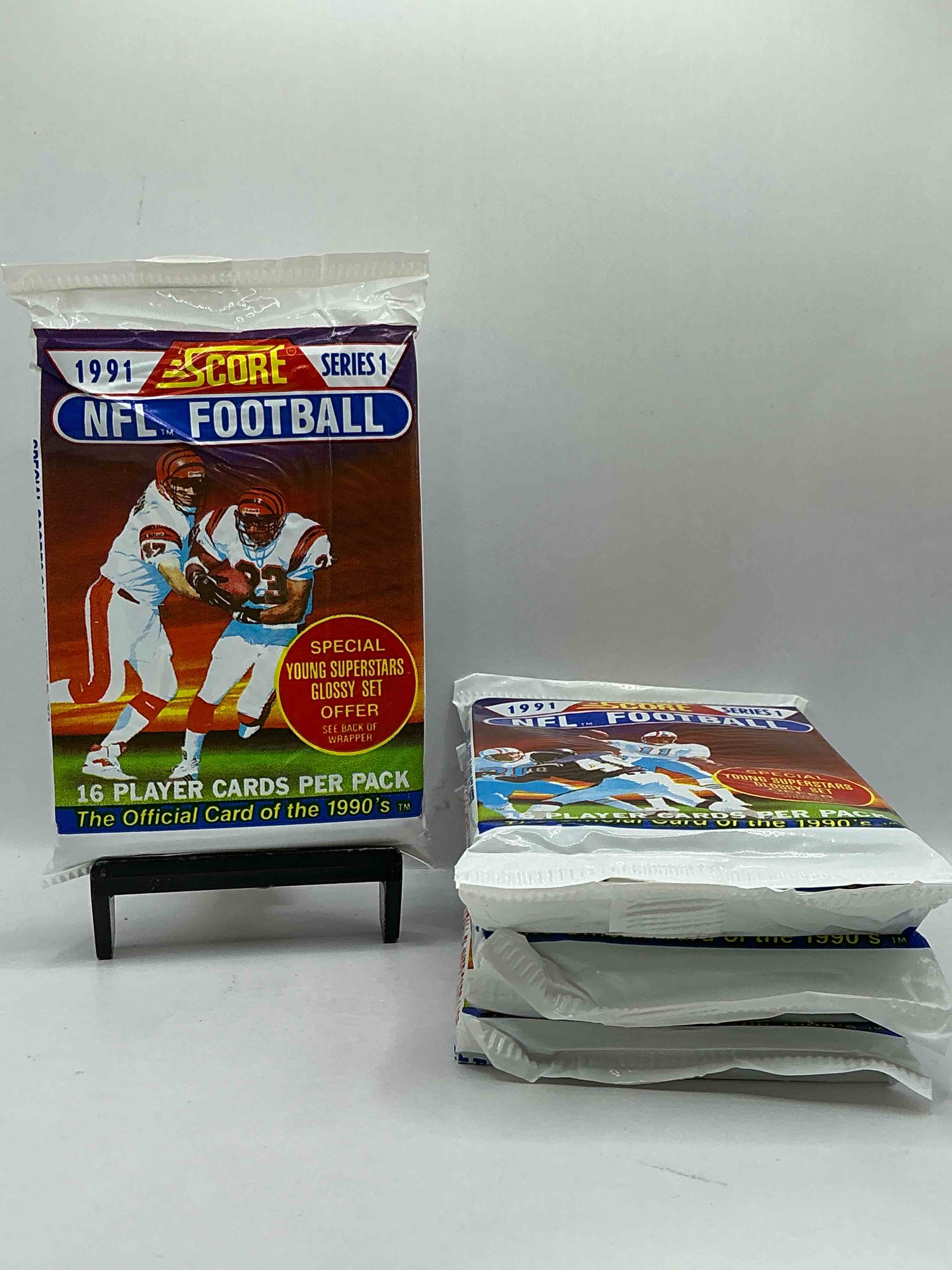 1991 NFL Score Football Sealed Card Pack, Direct From Original Retail Case! These Cards Are Sought After By Collectors For Their Awesome, Nostalgic Look. Search For Brett Favre Rookie, Early Jerry Rice, Early Emmit Smith, Joe Montana & So Much More!