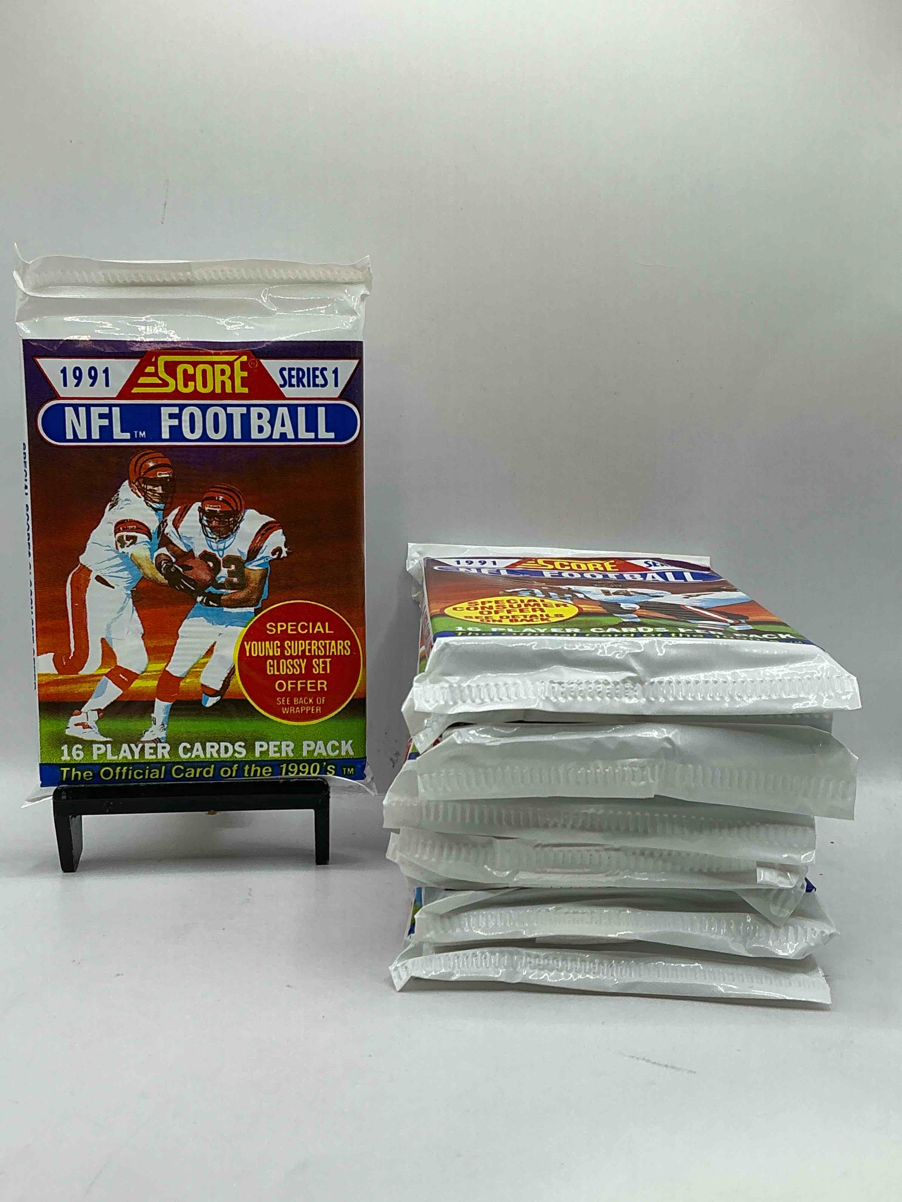 1991 NFL Score Football Sealed Card Pack, Direct From Original Retail Case! These Cards Are Sought After By Collectors For Their Awesome, Nostalgic Look. Search For Brett Favre Rookie, Early Jerry Rice, Early Emmit Smith, Joe Montana & So Much More!