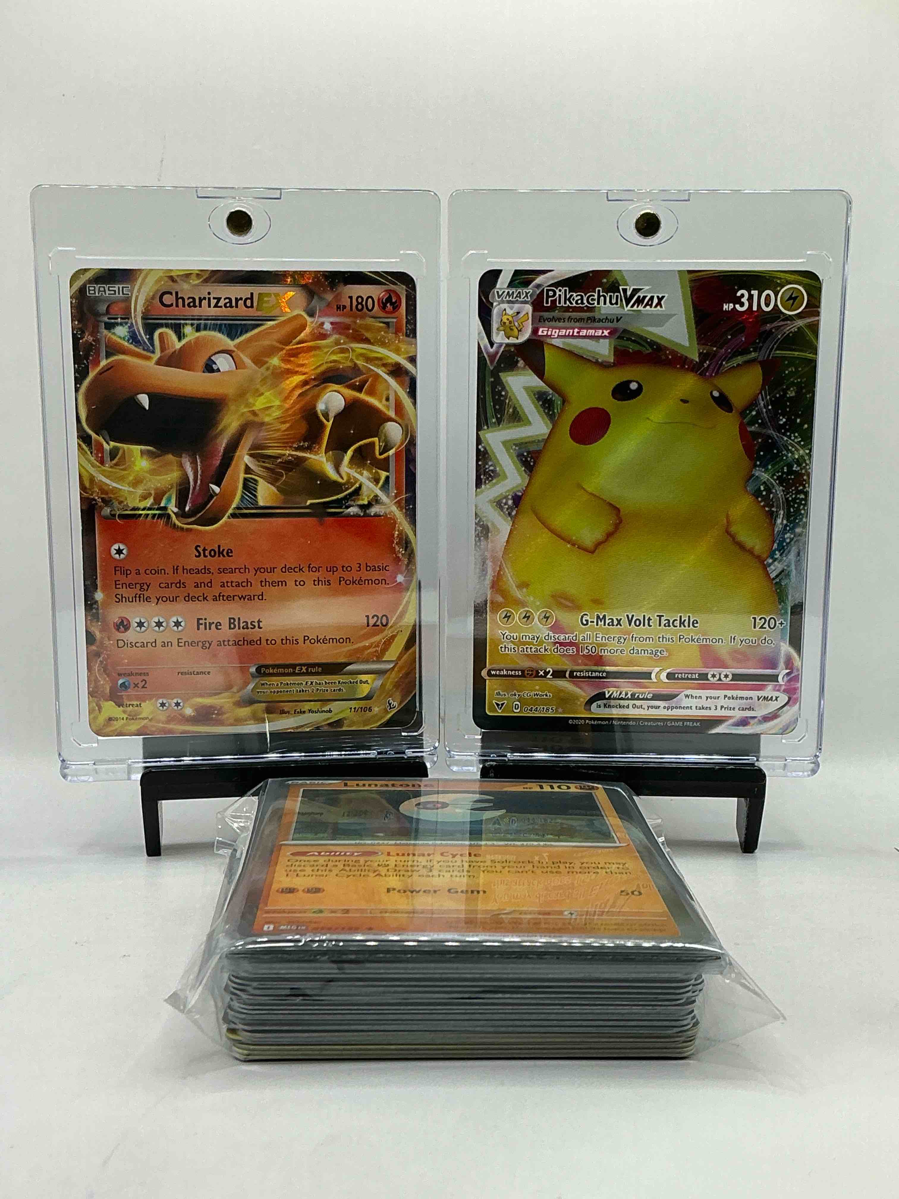 Pikachu VMAX Insane Holo Card, Charizard EX Holo & More! WOW! This 50 Card Pokémon Lot Includes Rare Cards From Charizard, Pikachu & More! It’s Also Filled With Commons, Holos, Legends & More!