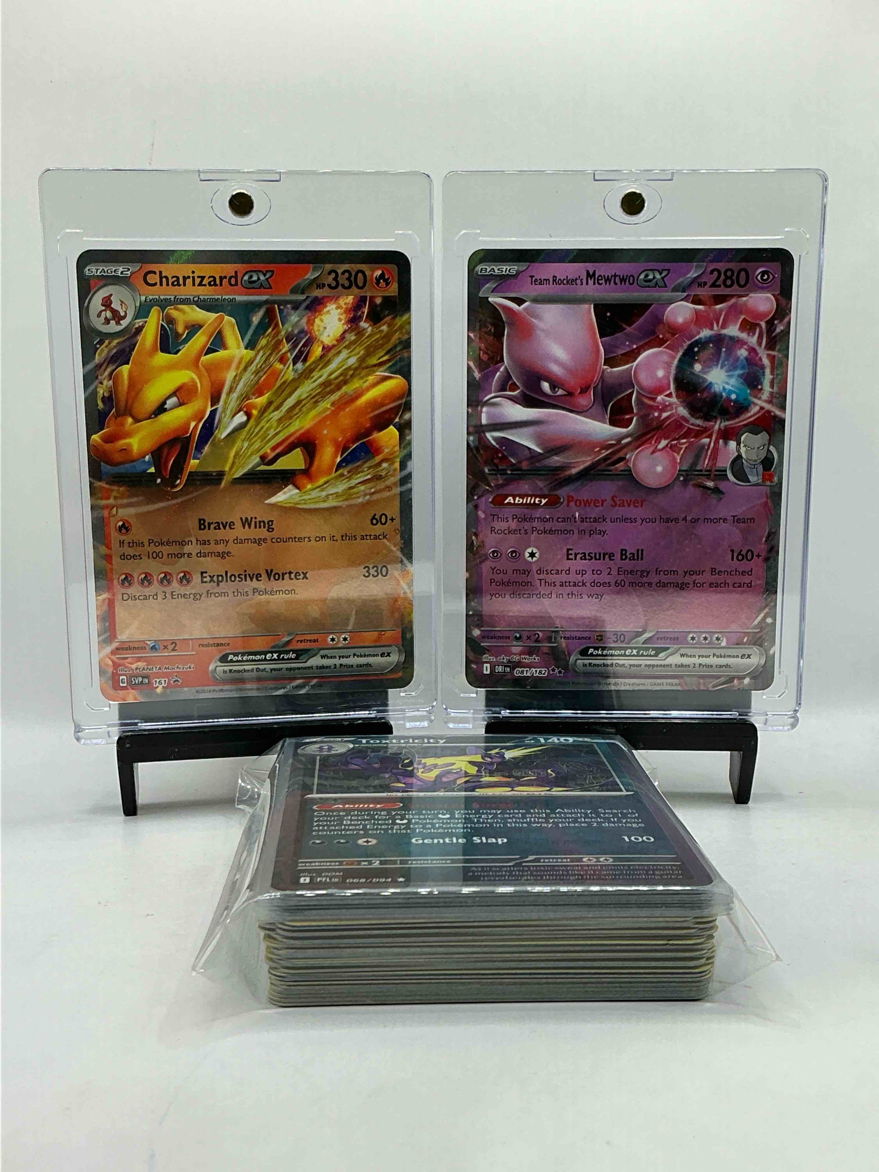 Charizard EX Slash Holo Design & Mewtwo Blast Holo! Insane Combo! The Hobby Is Only Going Up… Get These Awesome Cards While You Can! This 50 Card Lot Includes Commons, Legends, Holos, Heroes & More! WOW!