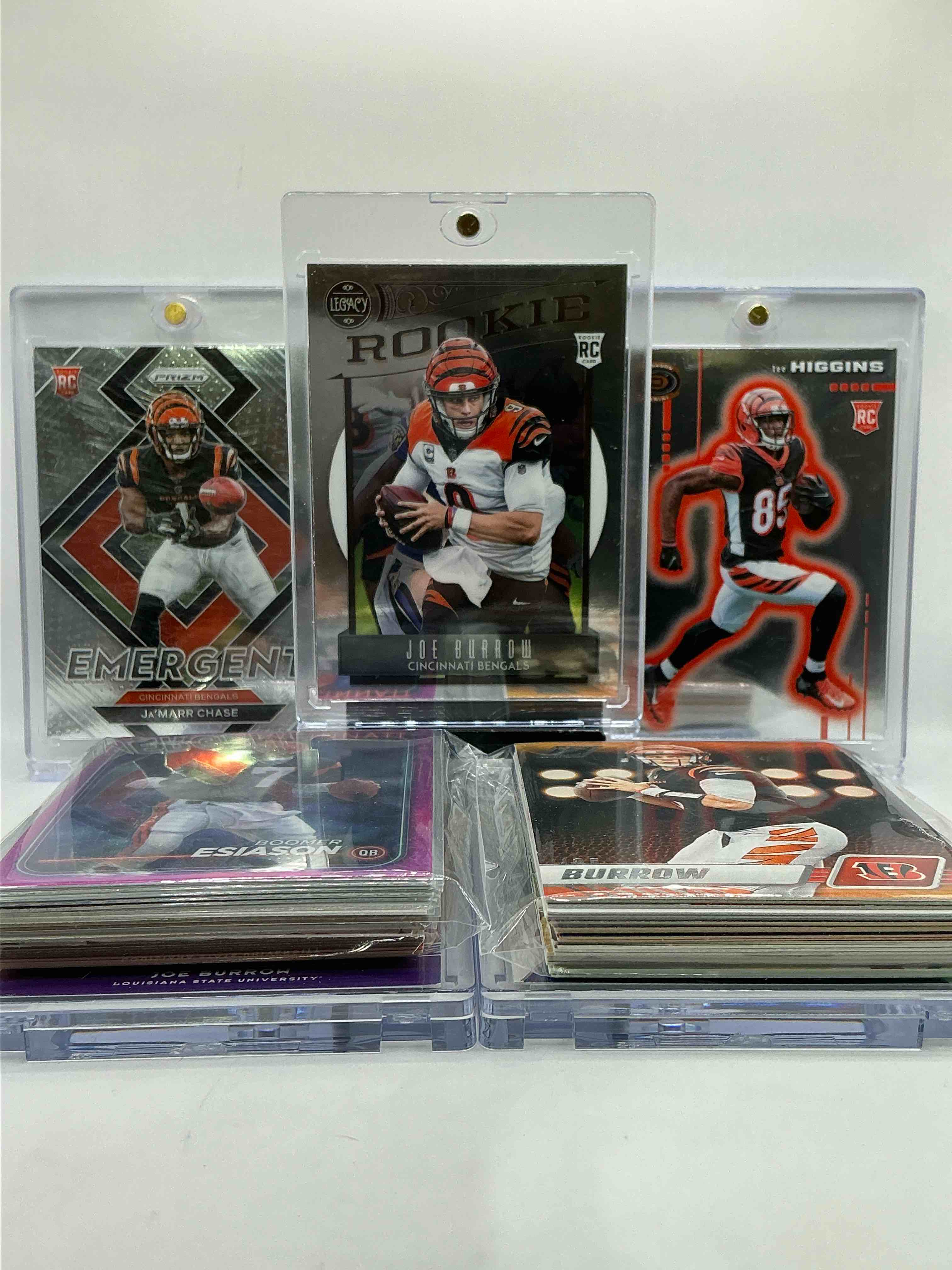 Joe Burrow Legacy Rookie Card, Ja’marr Chase Prizm Emergent Rookie, Tee Higgins Dynagon Silver Rookie Card & More! This 50 Card Bengals Lot Includes Rare Cards, Rookies, Legends, Heroes, Commons & More… Vintage & New Bengals!