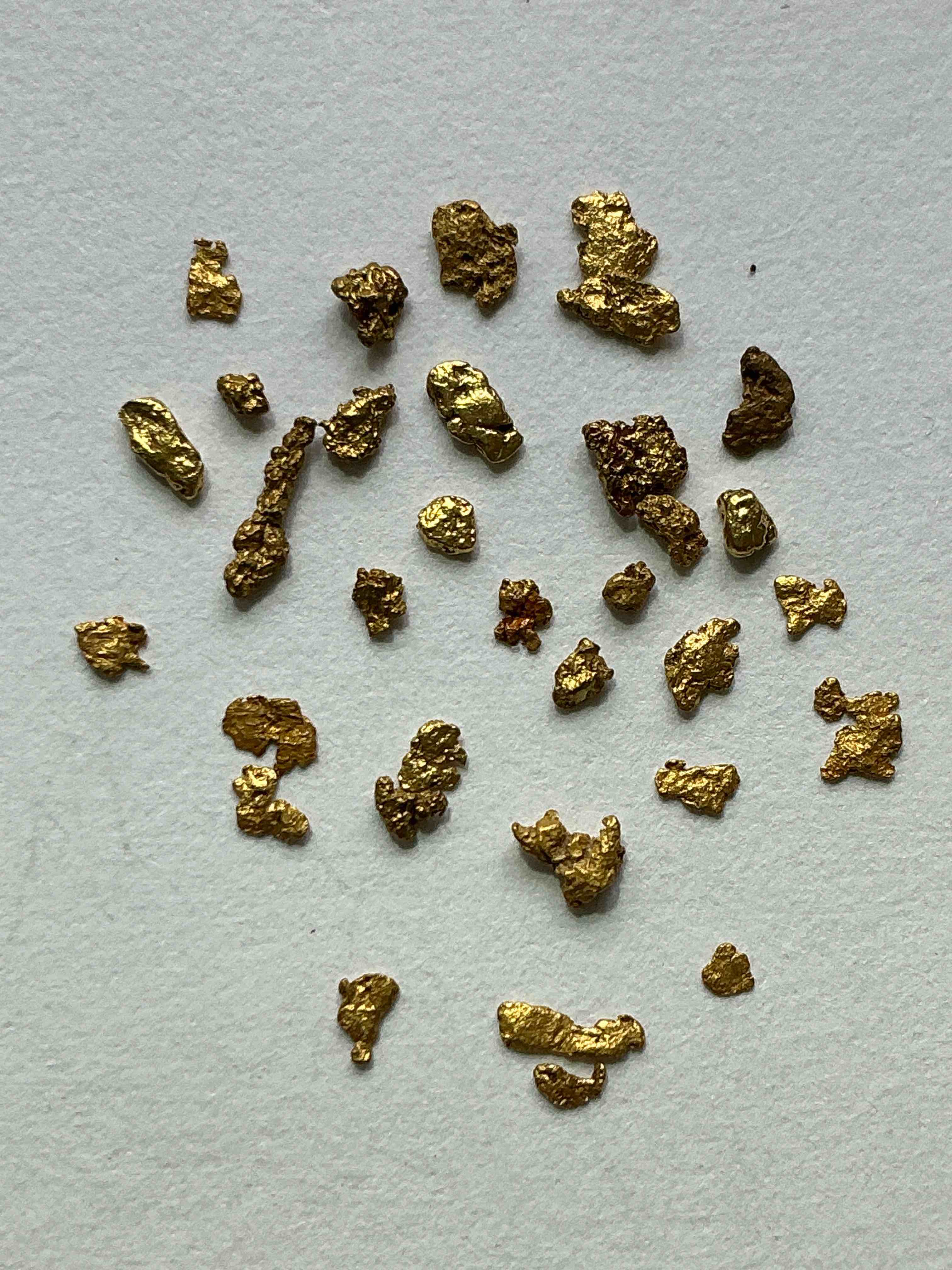 Genuine Gold Nuggets! Gold Nuggets Fresh From Prospecting North Carolina Mountains, Total Weight Of All Nuggets Is Approximately .5 Grams. These Gold Nuggets Typically Test At Between Approx 22-24 Karat. Gold In Raw, Prospected Form Is Extremely Hard To Find & Much Rarer Than Any Refined Form. Get In On The Gold Craze... Gold Has Increased In Value Over 40% In 2025 Alone! U.S. Dime For Size Reference Only (not included). Gold Vile In Image Included. Own Genuine, Gold Nuggets!