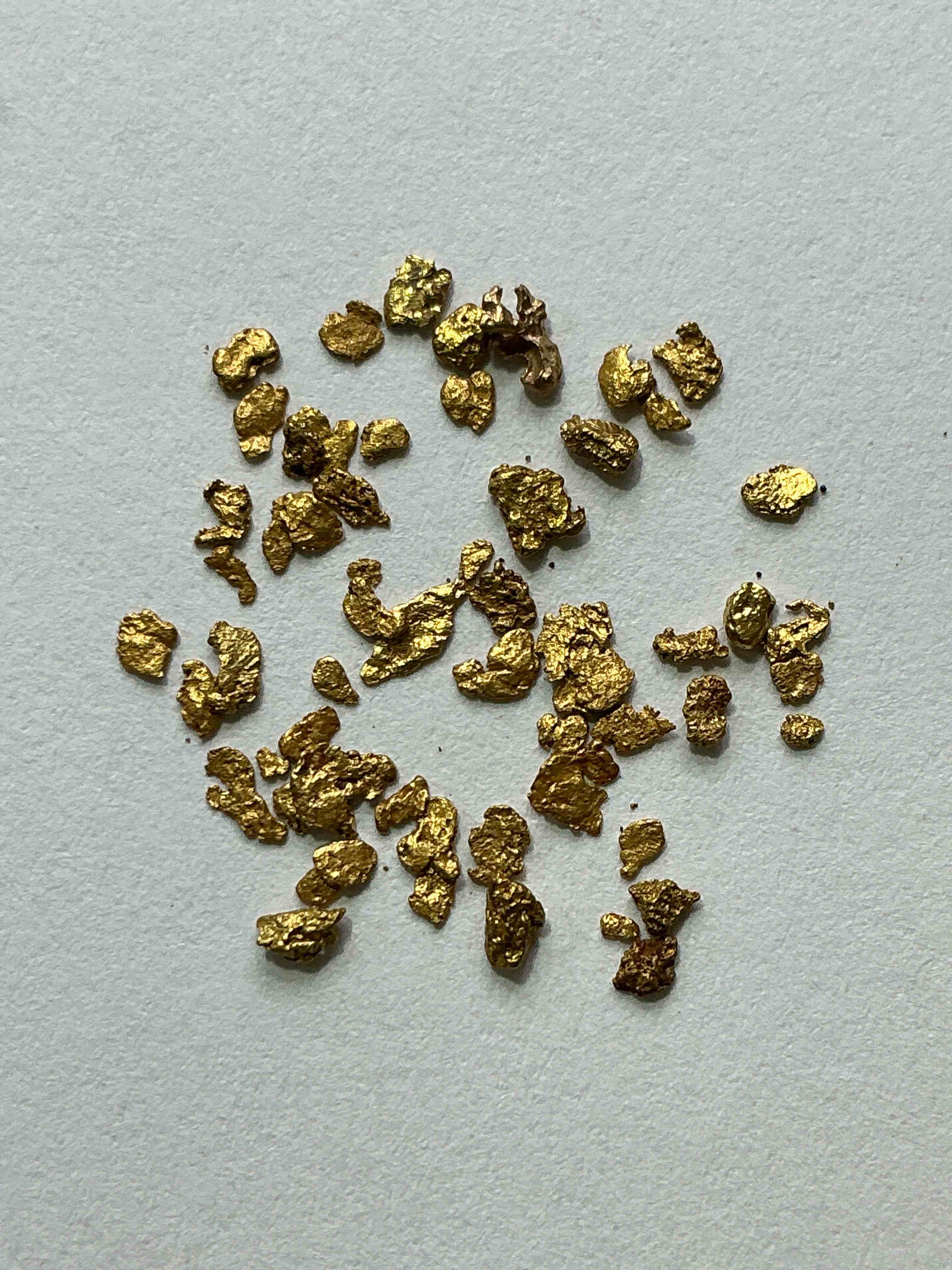 Genuine Gold Nuggets! Gold Nuggets Fresh From Prospecting North Carolina Mountains, Total Weight Of All Nuggets Is Approximately .5 Grams. These Gold Nuggets Typically Test At Between Approx 22-24 Karat. Gold In Raw, Prospected Form Is Extremely Hard To Find & Much Rarer Than Any Refined Form. Get In On The Gold Craze... Gold Has Increased In Value Over 40% In 2025 Alone! U.S. Dime For Size Reference Only (not included). Gold Vile In Image Included. Own Genuine, Gold Nuggets! 
