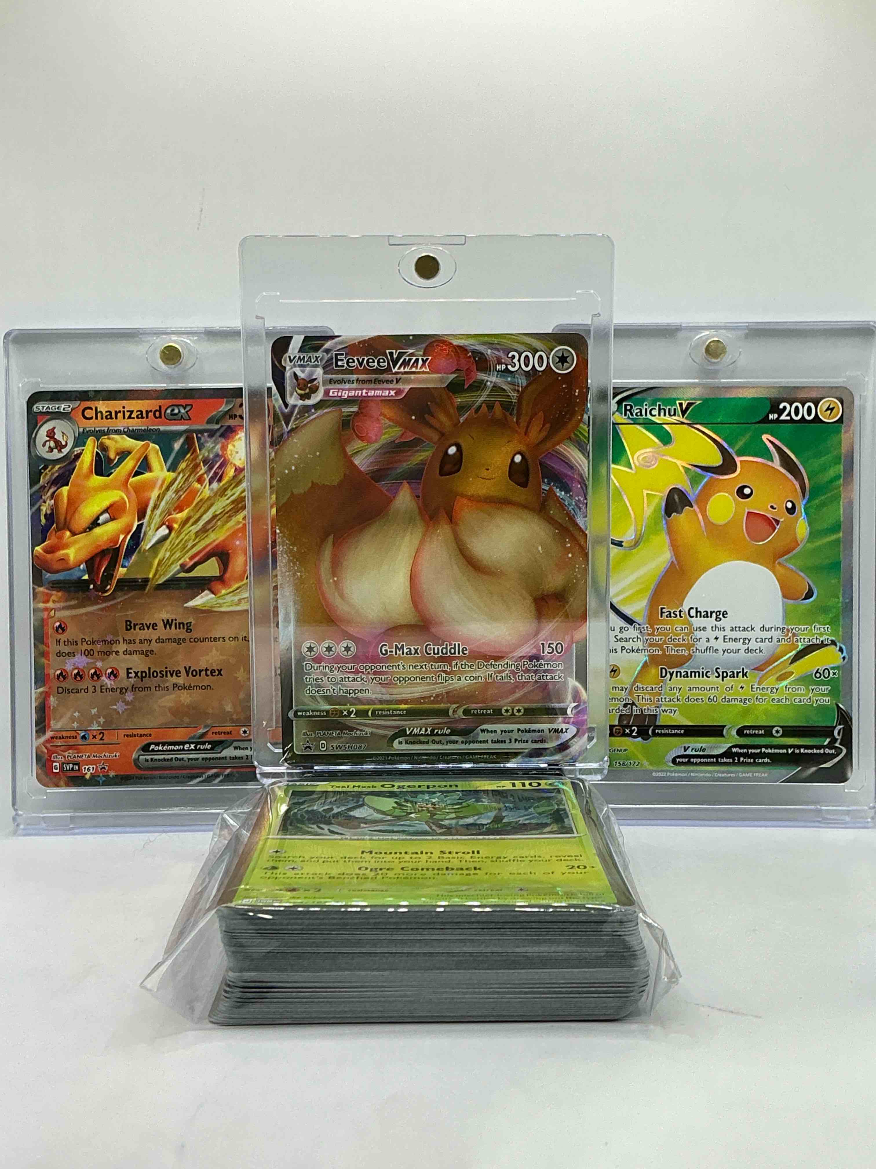 Charizard Ultra Rare Sparkle EX CARD, Eevee VMAX & Raichu V! Insane Trio! These Pokémon Are Rare & Fun To Collect! This 50 Card Lot Consists Of Legends, Heroes, Commons & More!