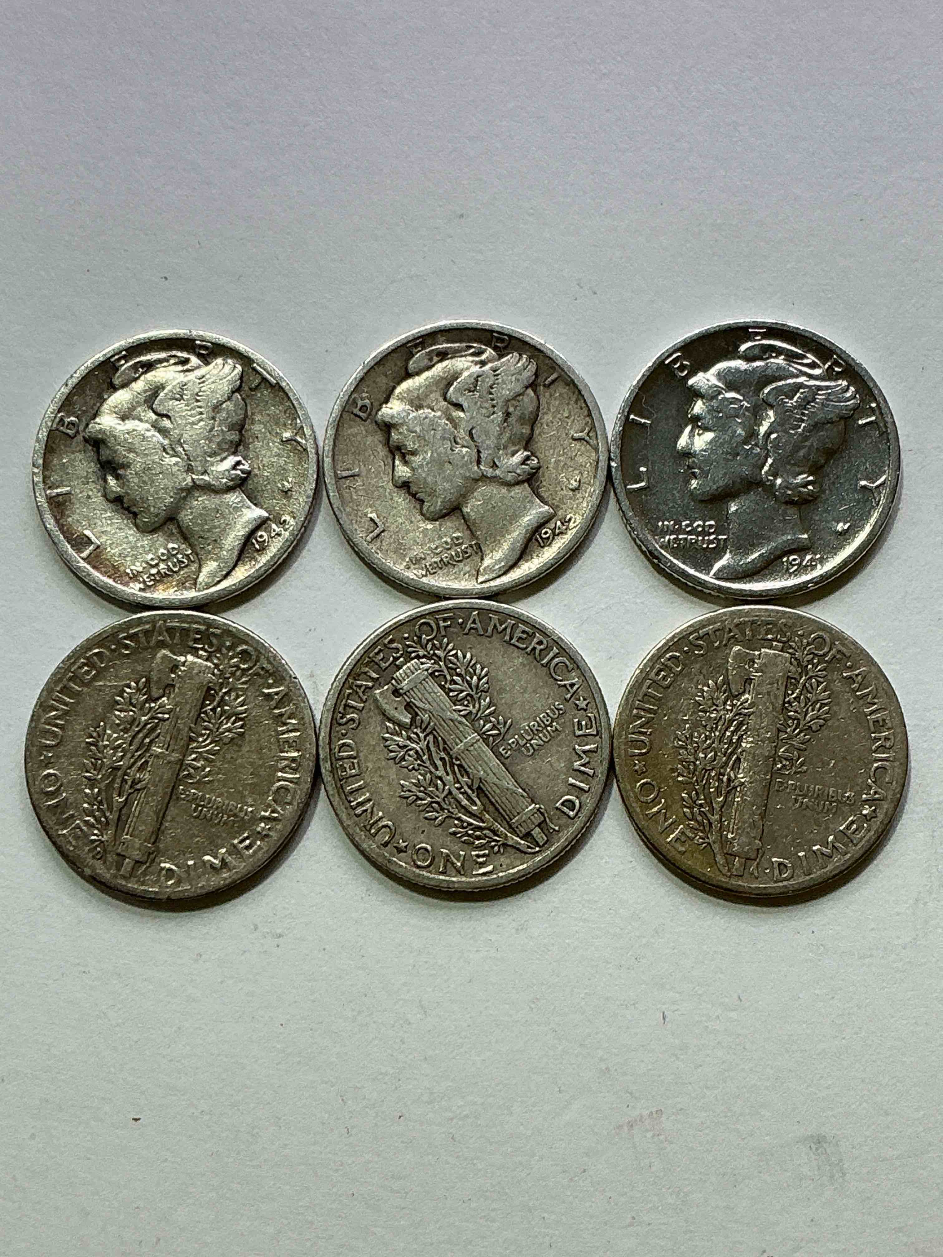 Antique U.S. Pure Fine Silver Mercury Dimes! Silver Mercury Dimes Were Minted From 1916-1945 & Have Become Serious Collector Items! Check Out These Awesome Examples, All In Nice, Circulated Condition With Visible Dates & Varying Years! Rare To Have Visible Dates! Makes For A Great Investment In Precious Metals, Mercury Dimes Are 90% Pure Fine Silver! They Don't Make Em' Like This Anymore!