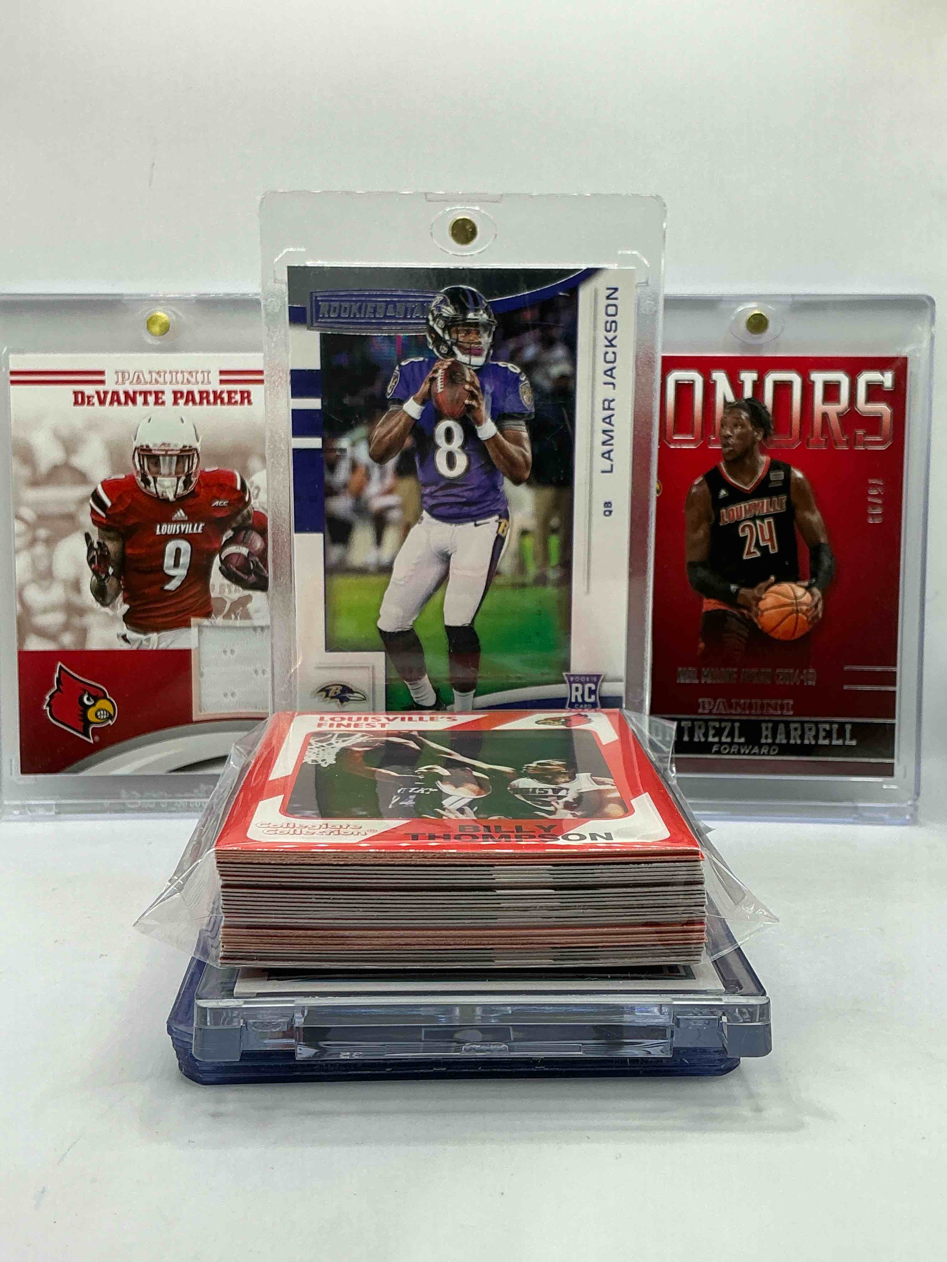 Louisville Legends! Lamar Jackson Rookies & Stars Rookie Card, Montrezl Harrell /99 & Devante Parker Player Worn Jersey Card! Insane Trio! Teddy Bridgewater, Darrell Griffith & More! This 50 Card Louisville Cardinals Lot Includes, Commons, Heroes, Legends, Rookies & More! WOW! Cardinals Craziness!