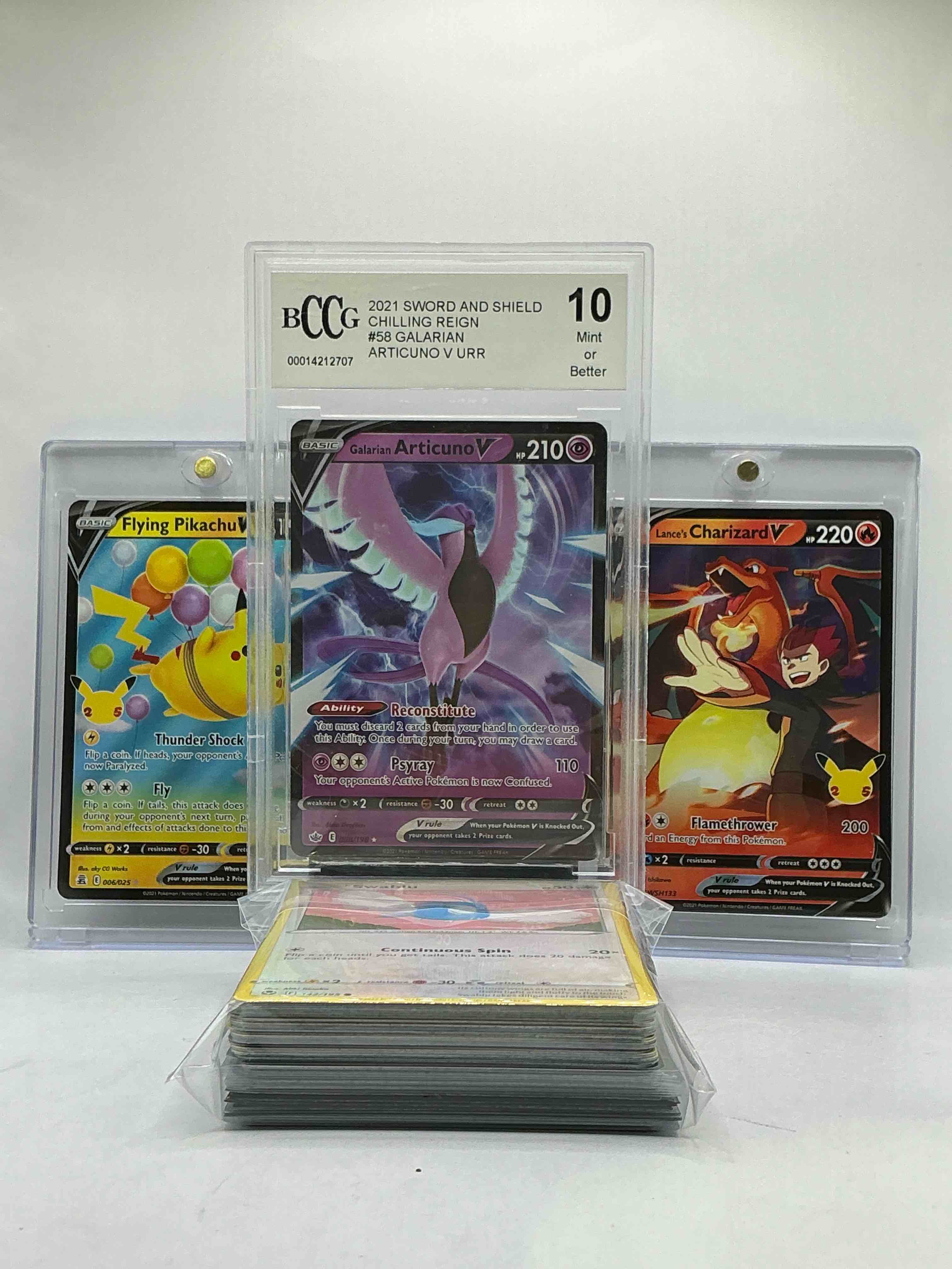 Pokémon Palooza! Purple Galarian Articuno V Gem Mint 10 Or Better! Flying Pikachu V Thunder Shock! Lance’s Charizard V Orange Flamethrower! Along with Commons, Holos, Legends, Heroes & More! All Included In This 50 Card Lot!