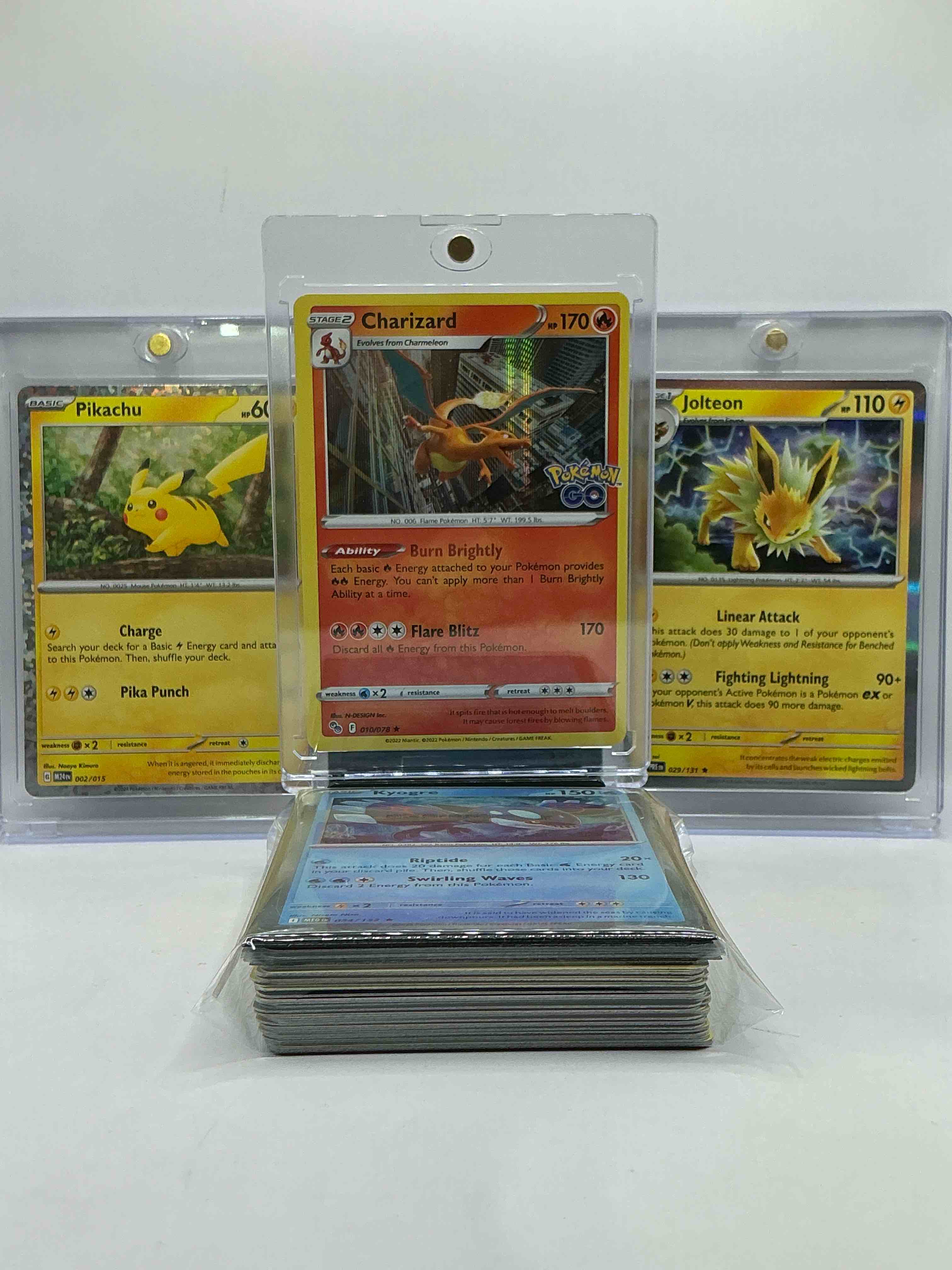 Charizard! Pikachu! Jolteon! Pokémon Palooza! Holos! These Three Pokémon Are Some Of The Most Popular! This 50 Card Lot Includes Legends, Heroes, Holos & More!