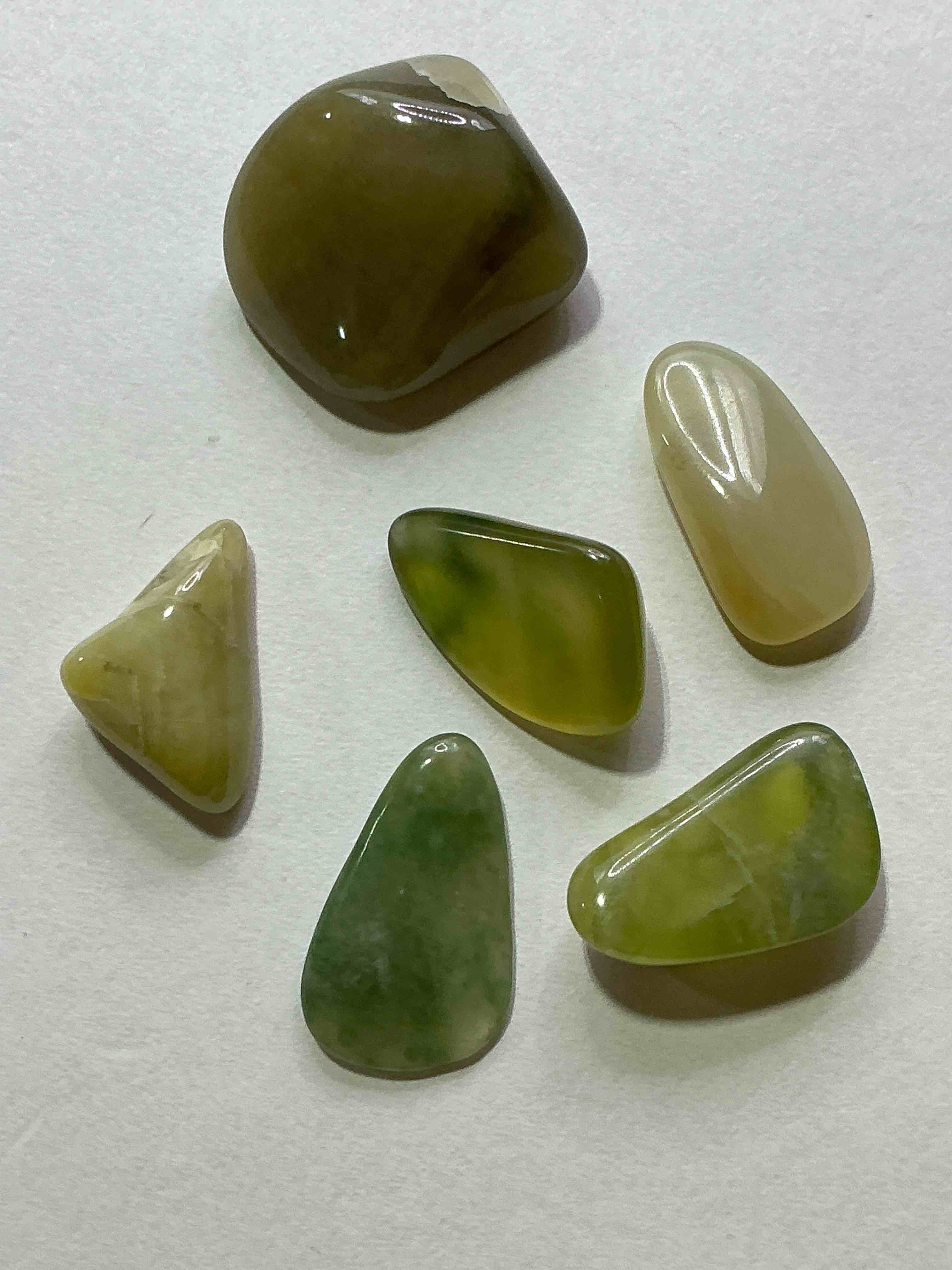 Jade Precious Gemstone, Authentic! Jade Gemstone, Cut, Faceted & Polished! Jade Stones Are Famous For Their Stunning Deep Green Colors & Are Considered Highly Significant In Many Cultures. In Ancient Chinese Cultures Jade Symbolized Harmony, Purity & Prosperity. In Modern Times Jade Symbolizes These Same Ancient Virtues. U.S. Dime In Image Is For Size Reference Only (Not Included). Own An Amazing, Stunning Gemstone!
