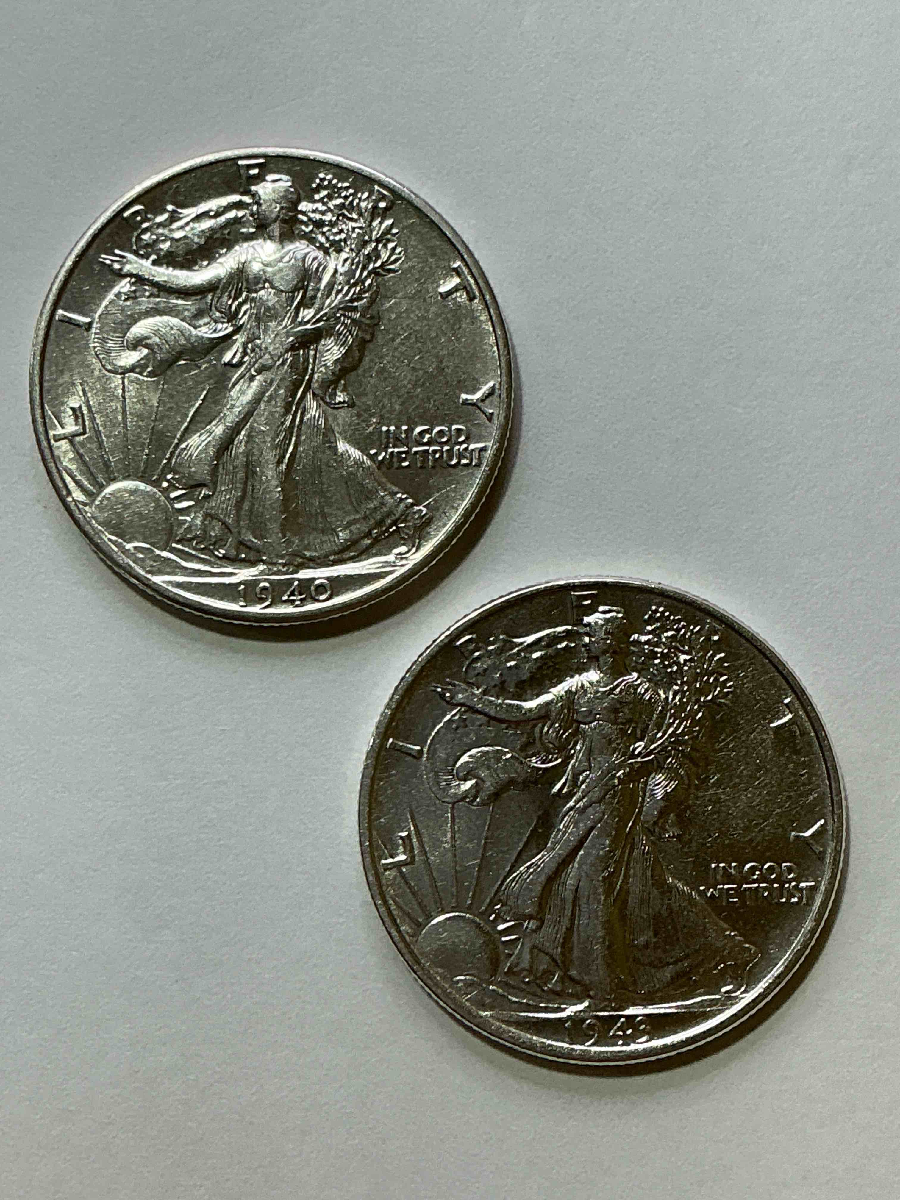 World War II Era Silver! Antique U.S. Silver! Liberty Walking Silver Fine U.S. Silver Half Dollar! This Striking Half Dollars Were Minted From 1916-1947 & Have Become Some Of The Most Collectible Coins In History! Here Is A Striking Circulated Example From 1940& 1943! Appears Uncirculated! Liberty Walking Coins Are 90% Fine U.S. Silver, A Great Investment In Precious Metal!