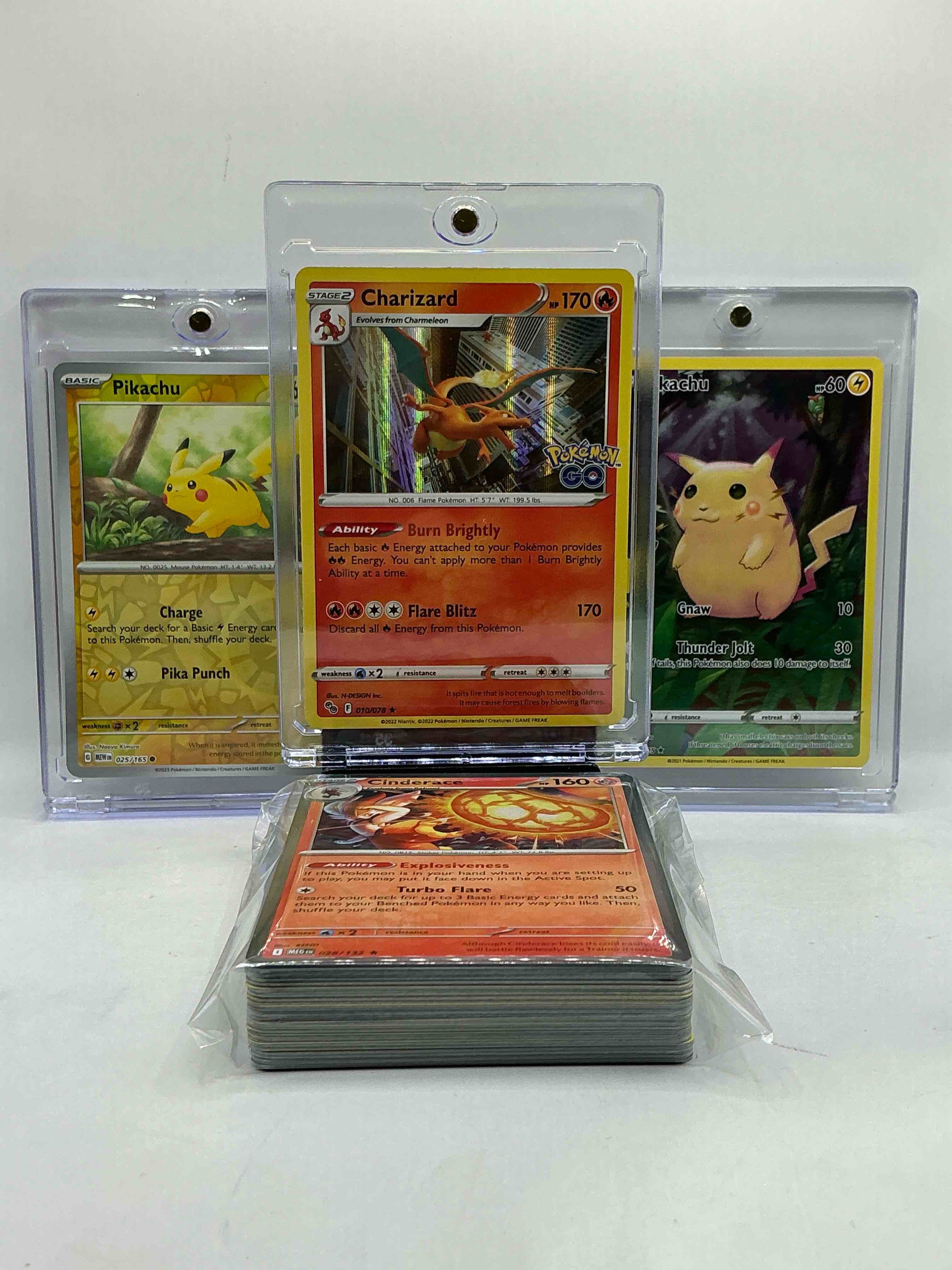 Pokémon Palooza! Charizard Radiant Holo, Pikachu Holos & More! Crazy Card Combo! This 50 Card Lot Includes Commons, Heroes, Legends & More!
