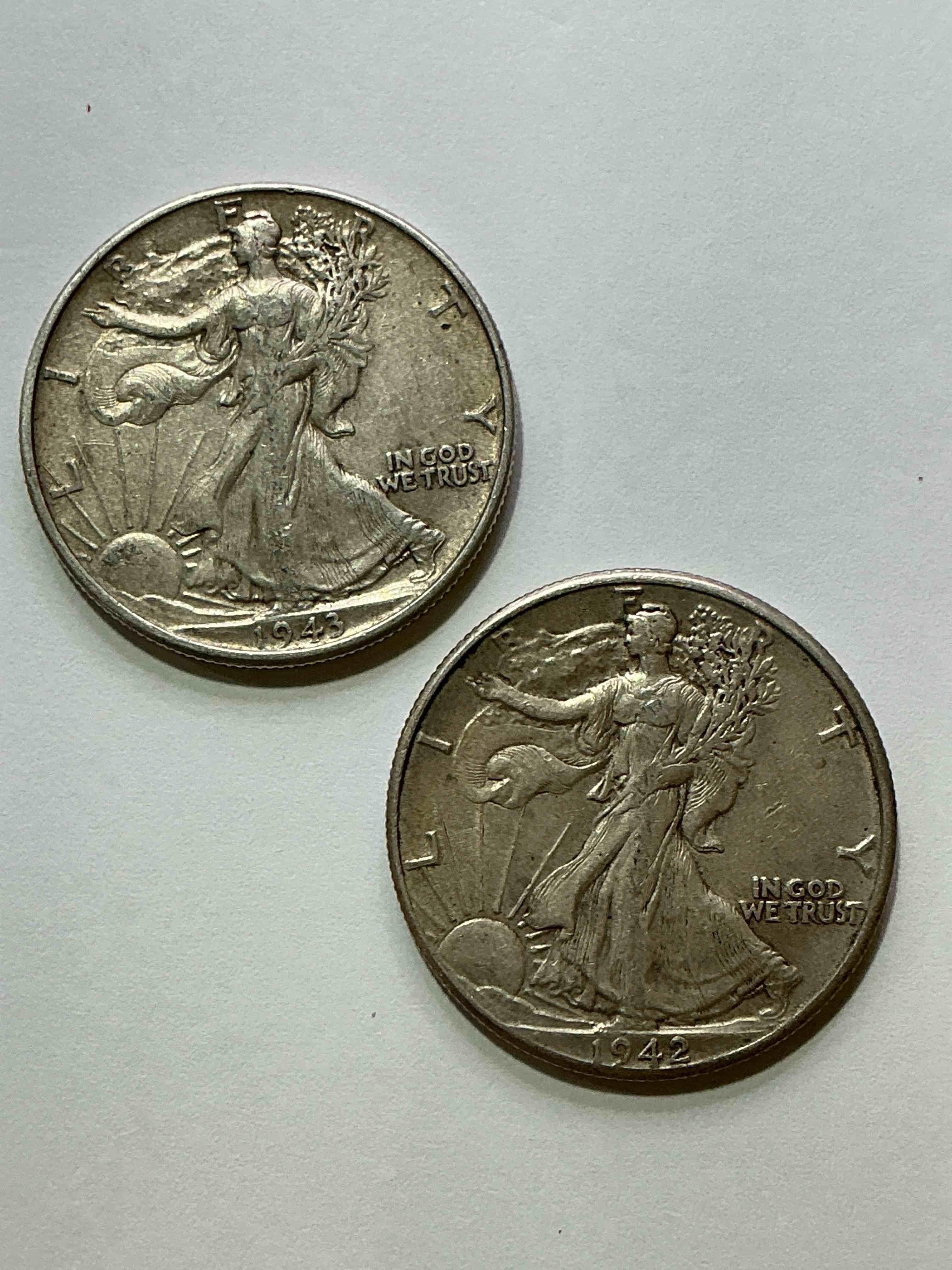 World War II Era Silver! Antique U.S. Silver! Liberty Walking Silver Fine U.S. Silver Half Dollar! This Striking Half Dollars Were Minted From 1916-1947 & Have Become Some Of The Most Collectible Coins In History! Here Is A Striking Circulated Example From 1943 & 1942! Circulated! Liberty Walking Coins Are 90% Fine U.S. Silver, A Great Investment In Precious Metal!
