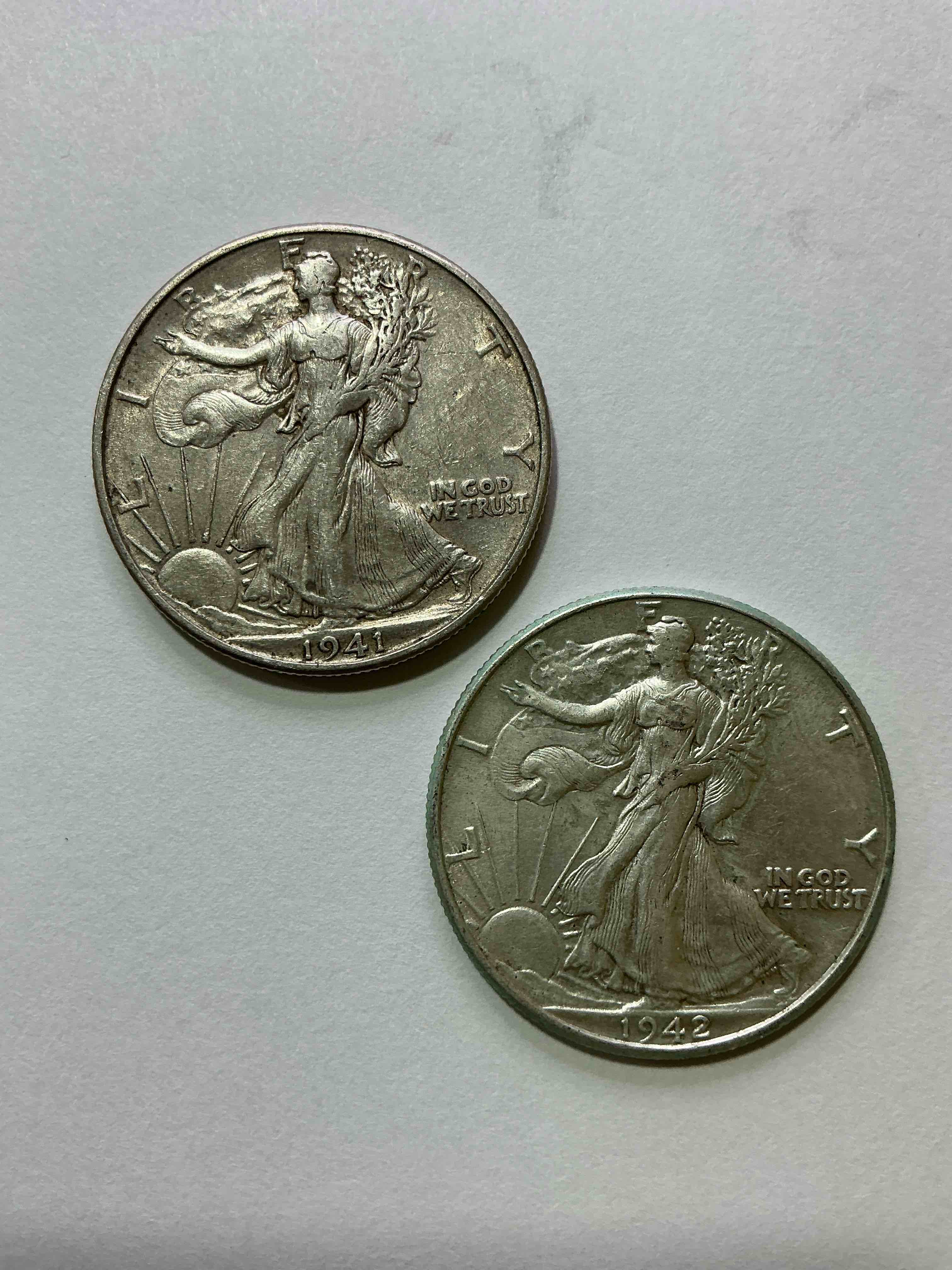 World War II Era Silver! Antique U.S. Silver! Liberty Walking Silver Fine U.S. Silver Half Dollar! This Striking Half Dollars Were Minted From 1916-1947 & Have Become Some Of The Most Collectible Coins In History! Here Is A Striking Circulated Example From 1941 & 1942! Circulated! Liberty Walking Coins Are 90% Fine U.S. Silver, A Great Investment In Precious Metal!