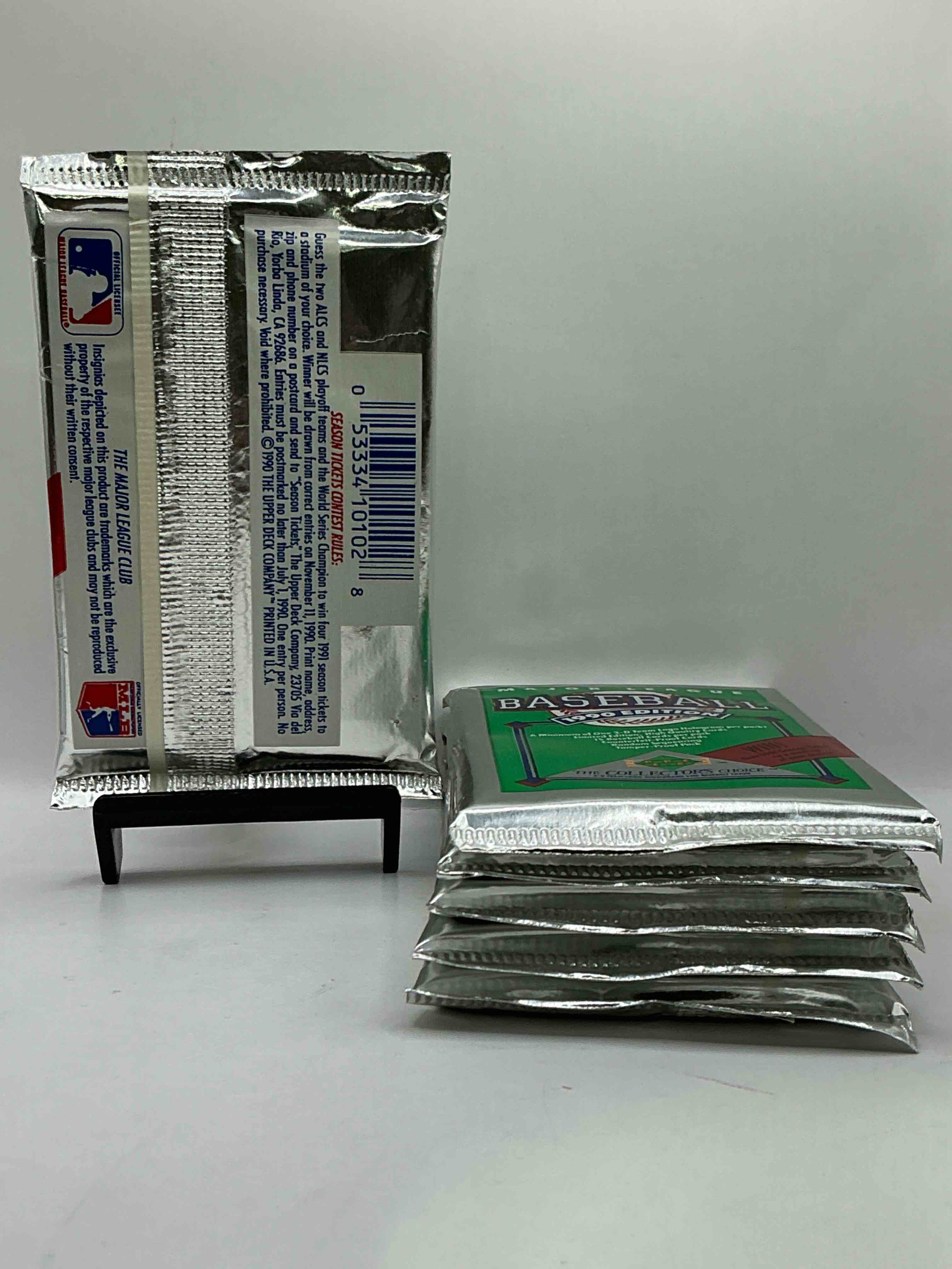 Condition photo showing New/Like New for 1990 Upper Deck Baseball Unopened Sports Trading Card Packs! Direct From Original Box! Look For Possible Collector's 3D Team Logo Card! As Well As Early Ken Griffey Jr. Cards!