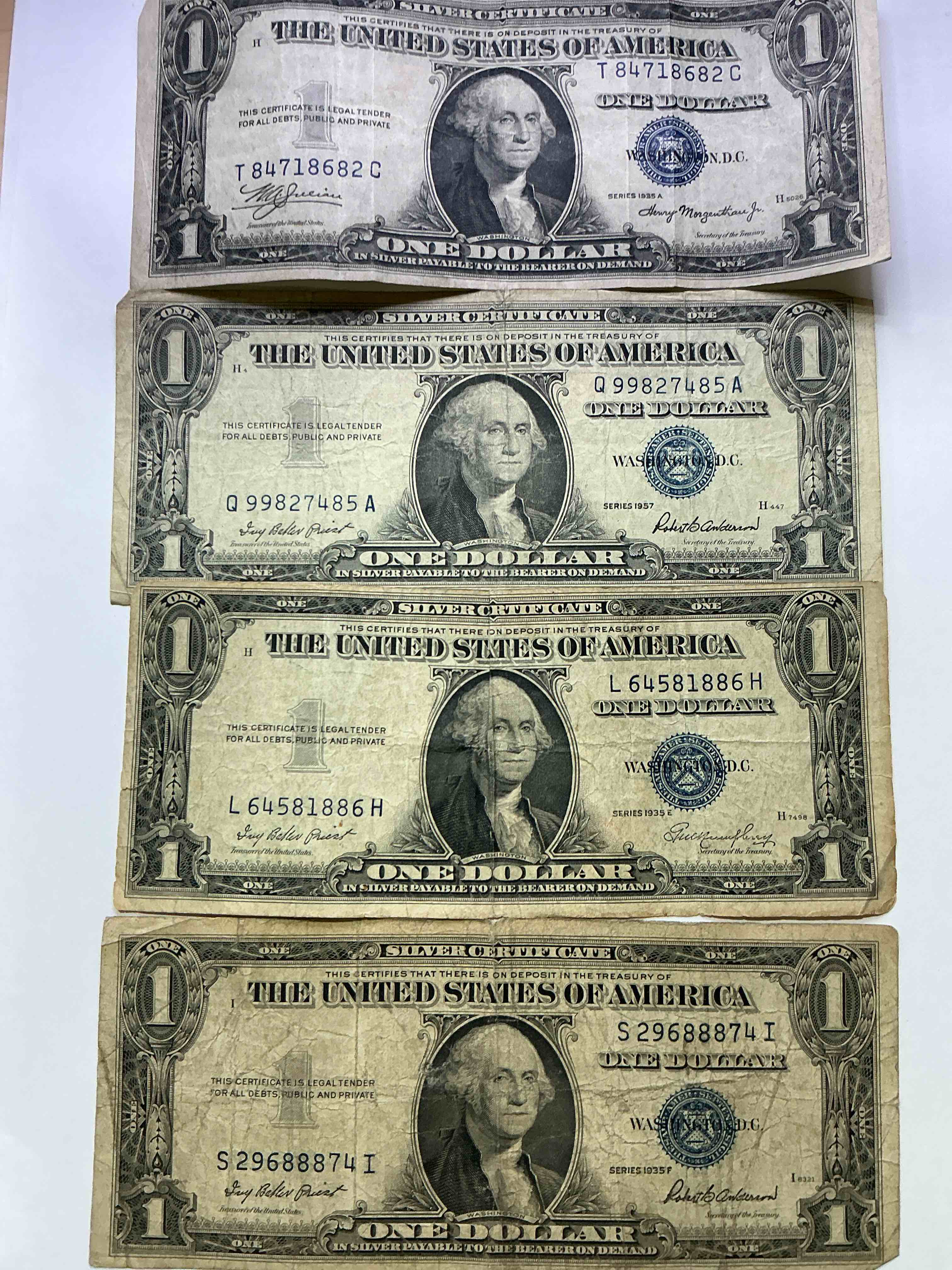 1957 & 1935 Silver Certificates! Did You Know That Prior To 1964 One Dollar U.S. Paper Money Was Actually Redeemable For Silver Dollars?! Wow How Times Have Changed! Silver Certificates Were Produced From 1878 To 1964 & Are Still Considered Legal Tender At Face Value. Here Are Gorgeous, Circulated 1935 & 1957 U.S. One Dollar Silver Certificate, With Highly Collectible "Blue Seal!* Own An Awesome Piece Of History!