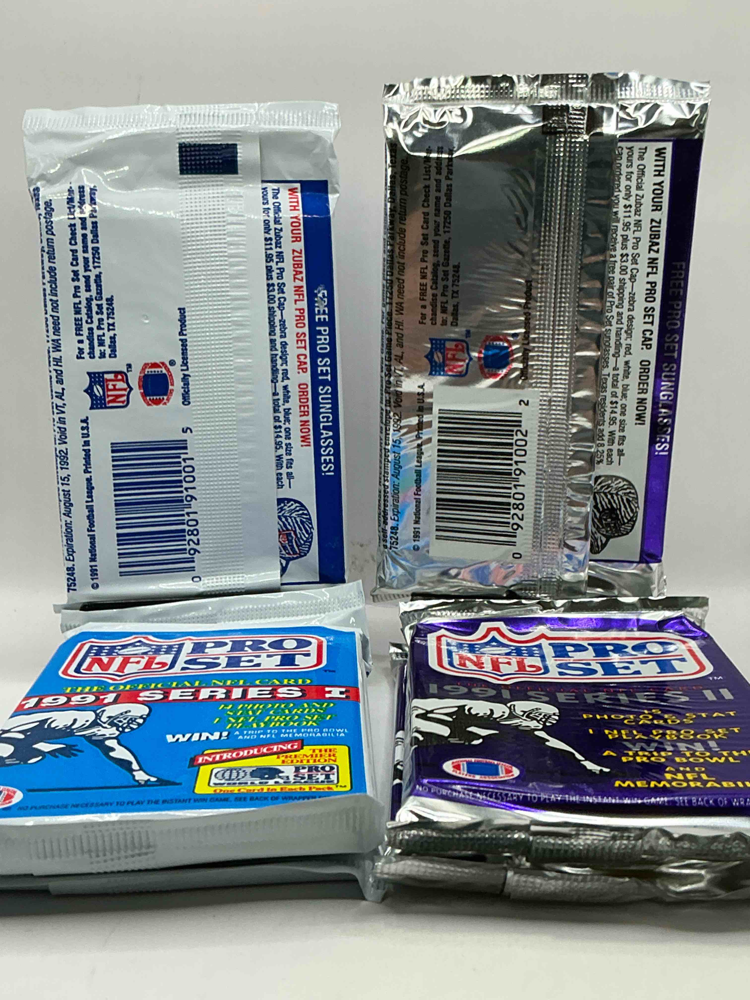 Condition photo showing New/Like New for Wow! 1991 Pro Set Football Sealed Card Pack, Direct From Original Retail Case!Highly Sought After By Collectors As This Year Is Loaded With High Profile Cards!Search For Cards From Barry Sanders, Deion Sanders, Troy Aikman, Michael Irvin & Much More! Getting Hard To Find!