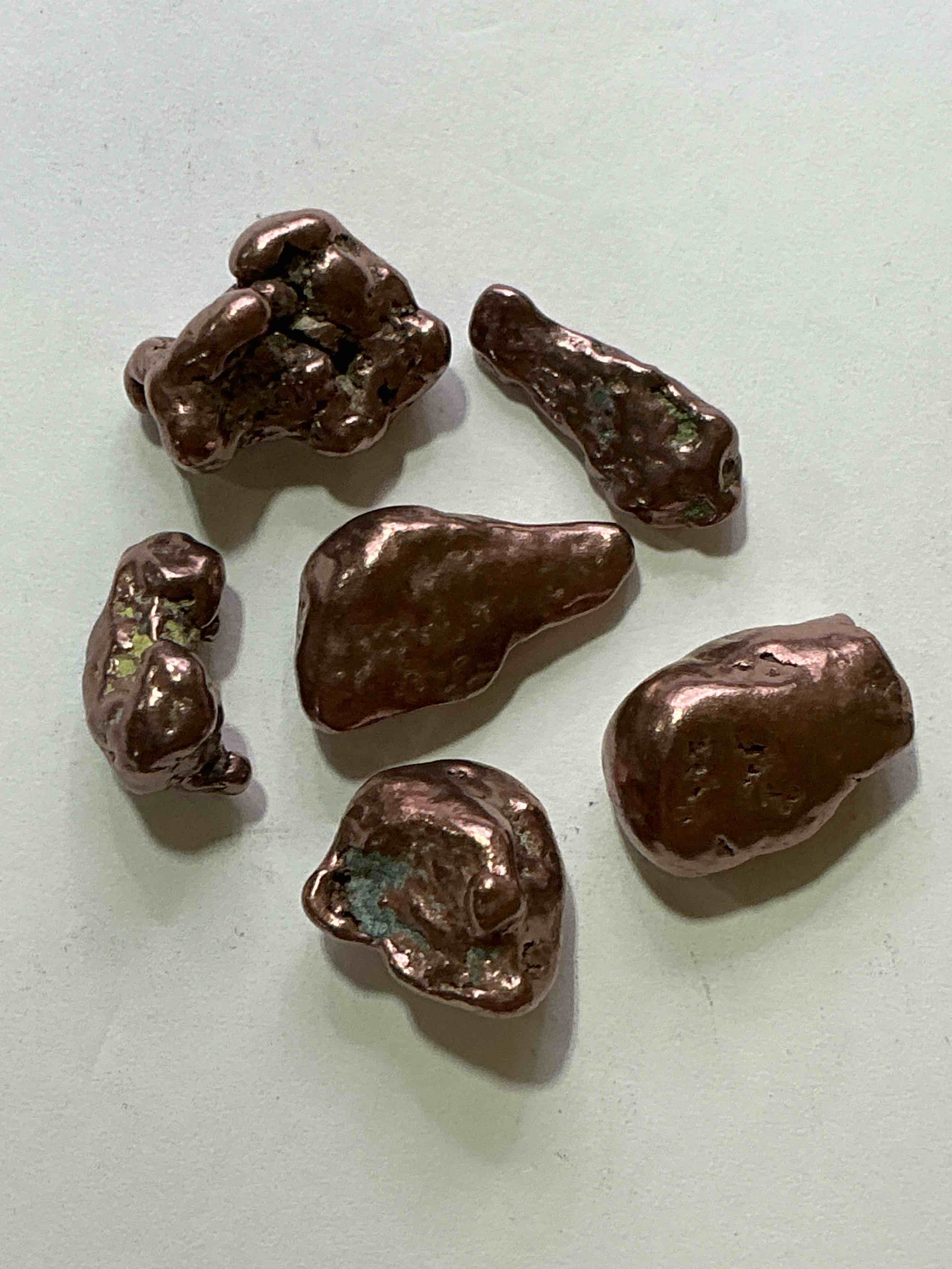 Copper Nuggets In Rare Form! Check Out These Rarely Seen Approximately .999 Copper Nuggets Direct From Prospecting In Copper Harbor, Michigan! Copper In Nugget Form Is Rarely Seen & Each Piece Is Completely Unique. A Great Investment In Fine U.S. Michigan Copper & Also Really Cool Conversation Pieces!