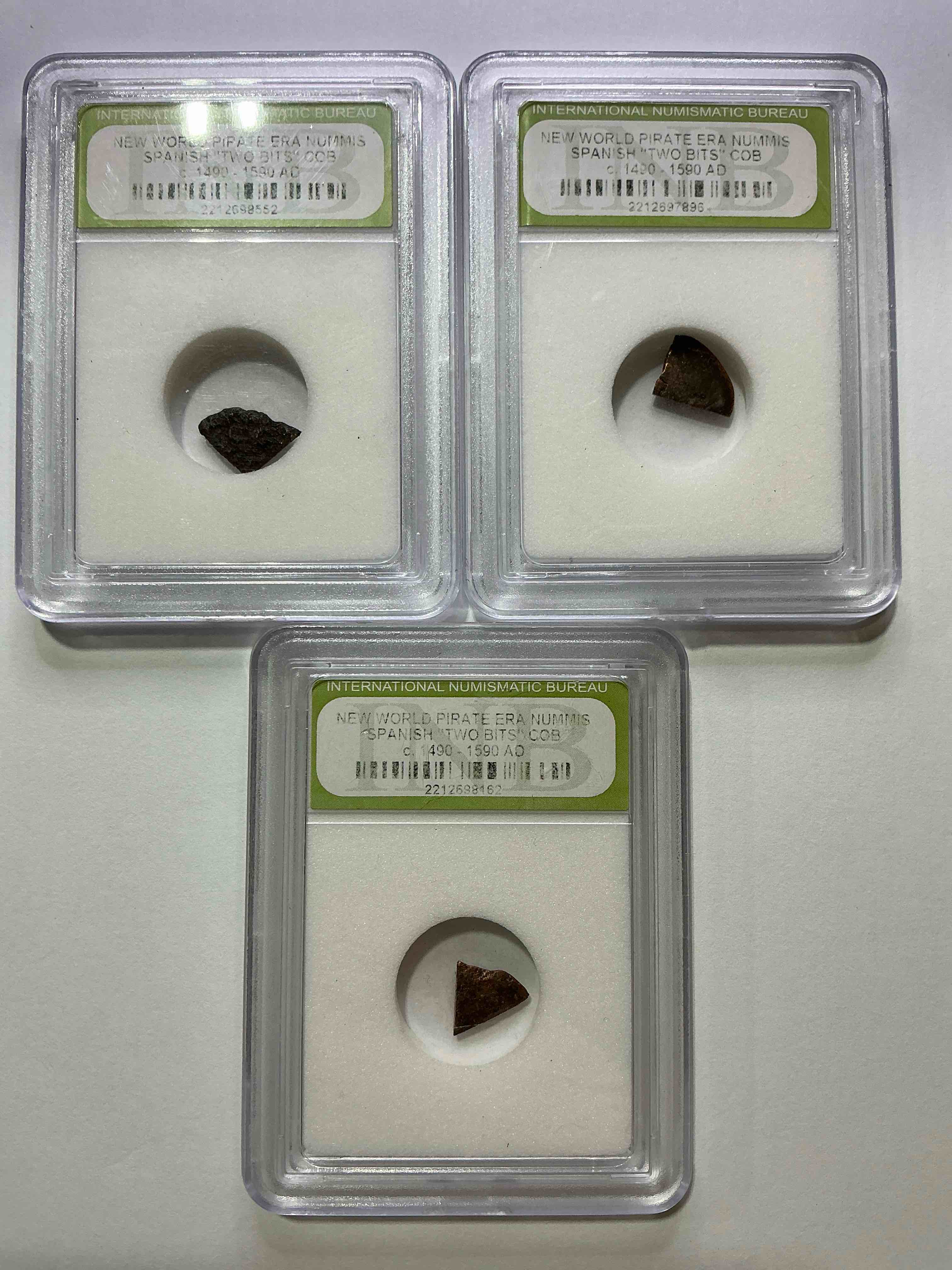 Pirate Era Spanish "Two Bits" Coin, Authentic! Circa 1490-1590, 400 To 500 Years Old! These Copper "Two Bit" Pieces Were Hand Cut Off Larger Coins In The Golden Pirate Age To Create Smaller Denominations. A Genuine Piece Of Cool History! A Great Authentic Pirate Era Collectible Encased In INB Slab!