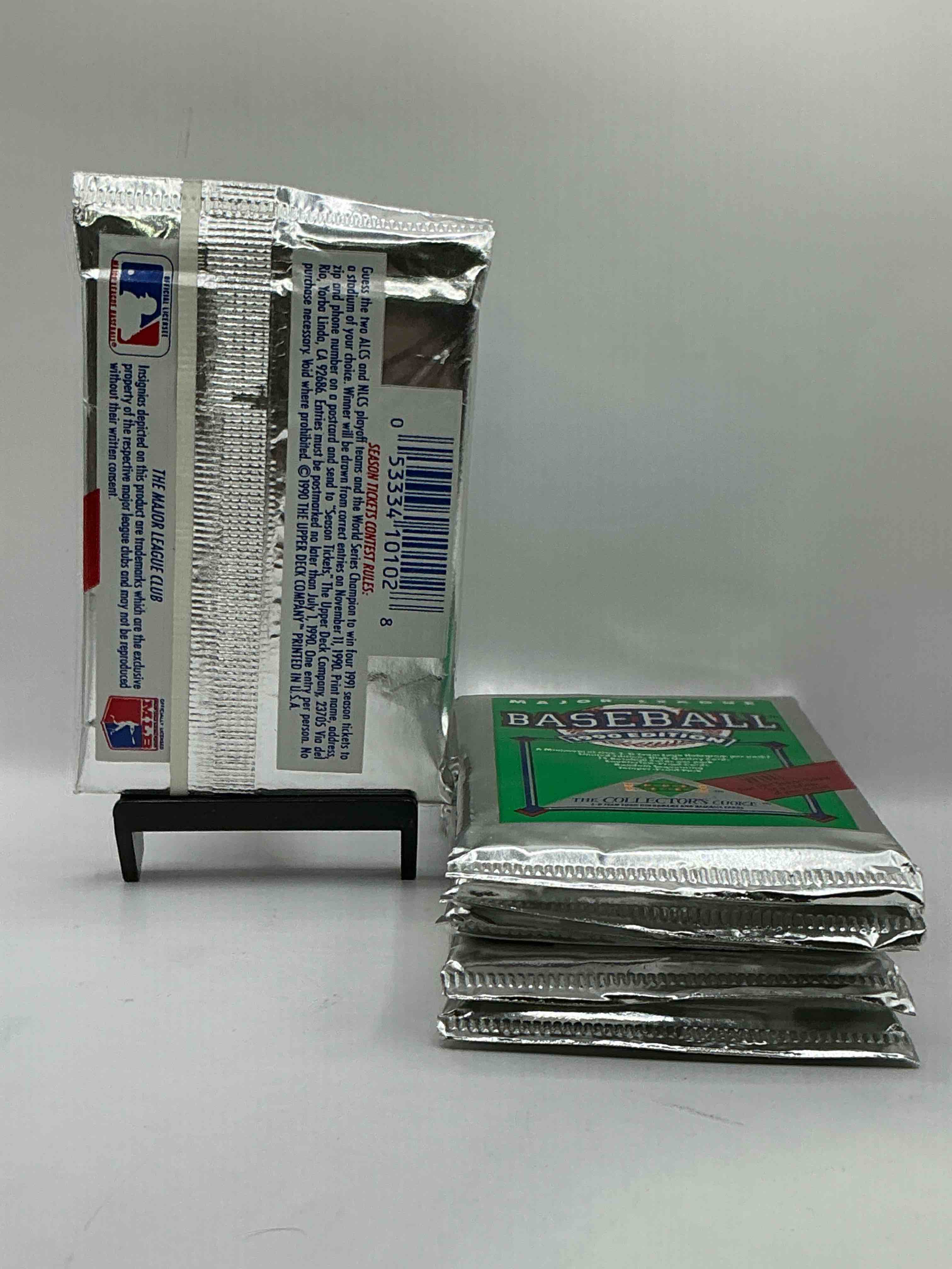 Condition photo showing New/Like New for 1990 Upper Deck Baseball Unopened Sports Trading Card Packs! Direct From Original Box! Look For Possible Collector's 3D Team Logo Card! As Well As Early Ken Griffey Jr. Cards!