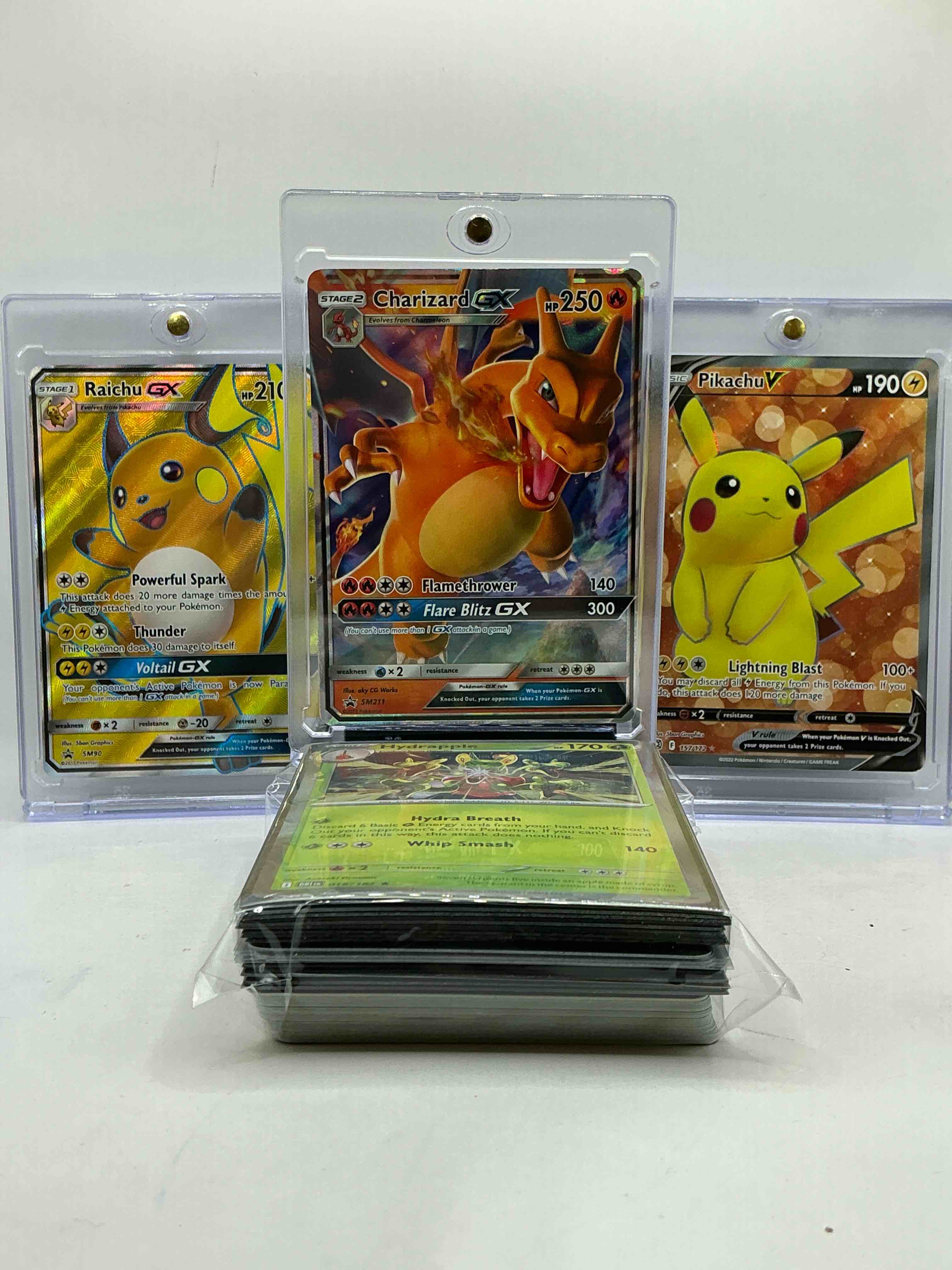Charizard GX Flamethrower Flare Blitz, Raichu GX Powerful Spark, Pikachu V & More! Pokémon Palooza! This 50 Card Lot Includes Rare Cards, Legends, Heroes & More!