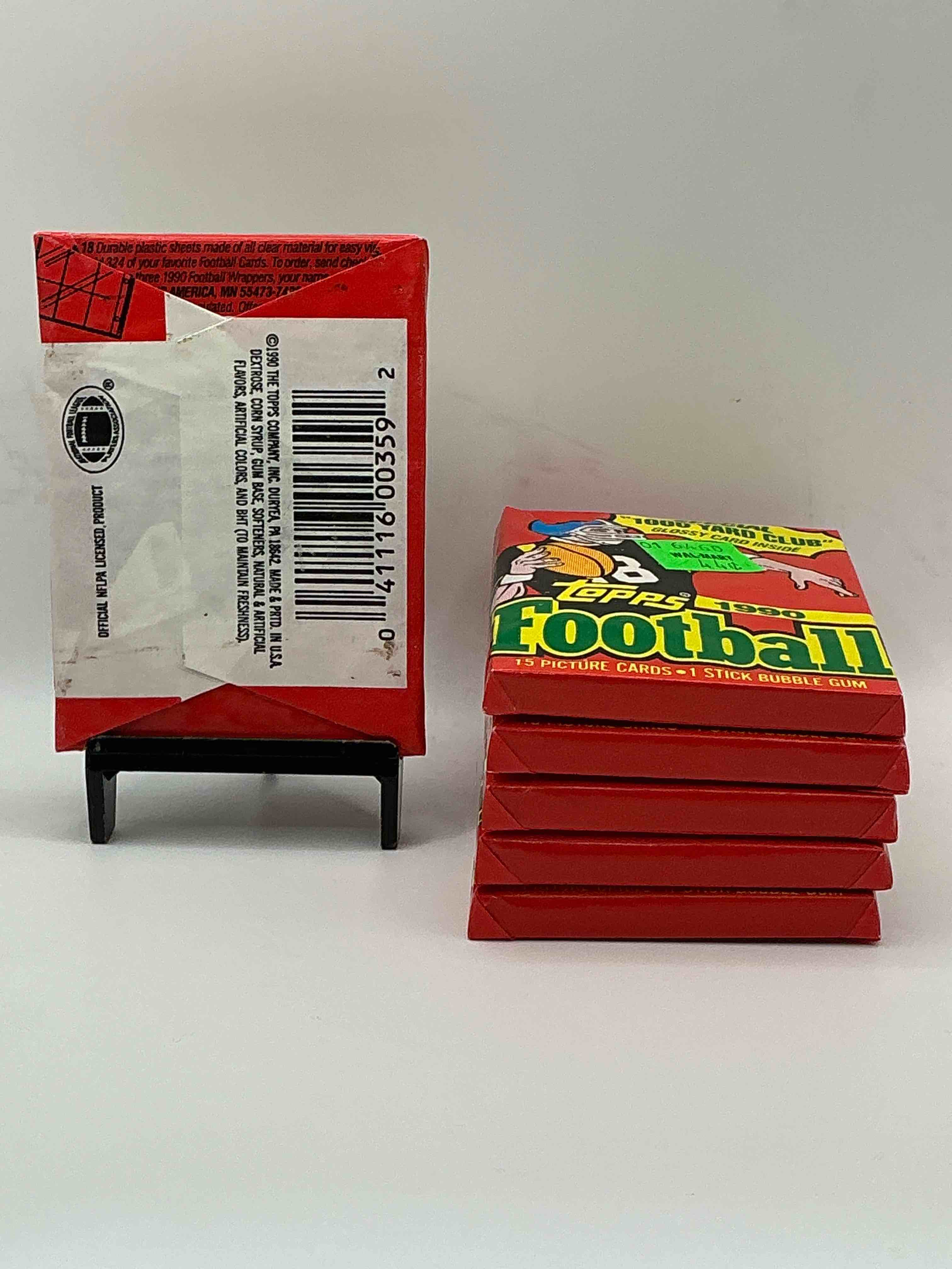 Condition photo showing New/Like New for The Last Year Of Football Wax! Joe Montana, Emmitt Smith & Barry Sanders!? 1990 Topps Football Unopened Sports Card Wax Pack, Direct From Original Retail Box! Getting Hard To Find! Search For Early Barry Sanders & Jerry Rice & So Much More!