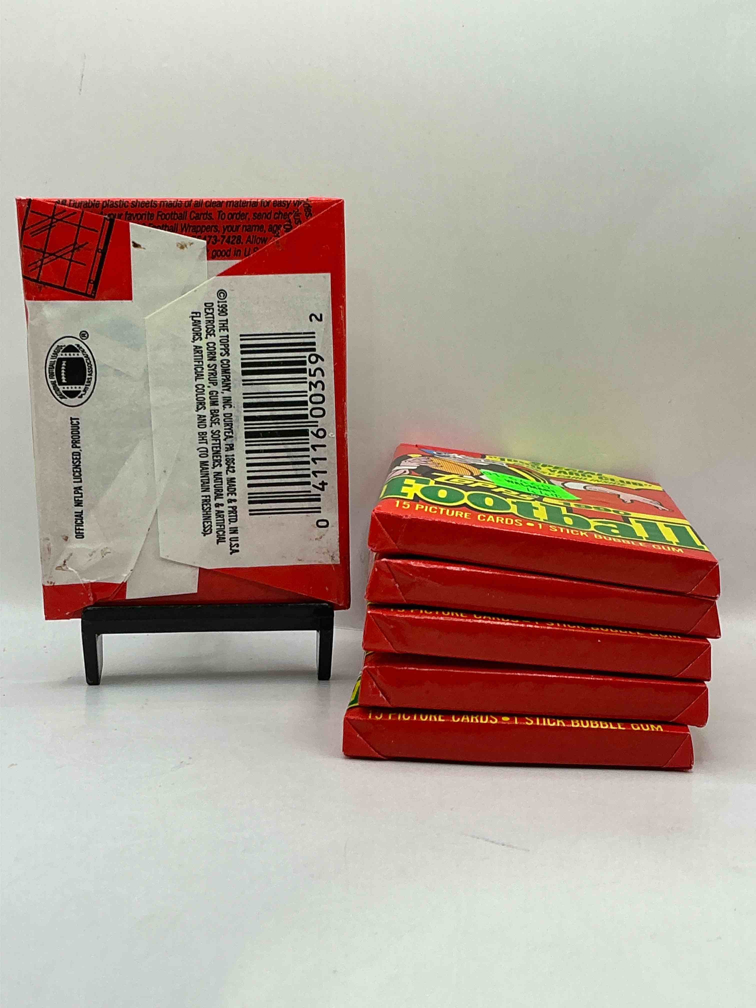 Condition photo showing New/Like New for The Last Year Of Football Wax! Joe Montana, Emmitt Smith & Barry Sanders!? 1990 Topps Football Unopened Sports Card Wax Pack, Direct From Original Retail Box! Getting Hard To Find! Search For Early Barry Sanders & Jerry Rice & So Much More!