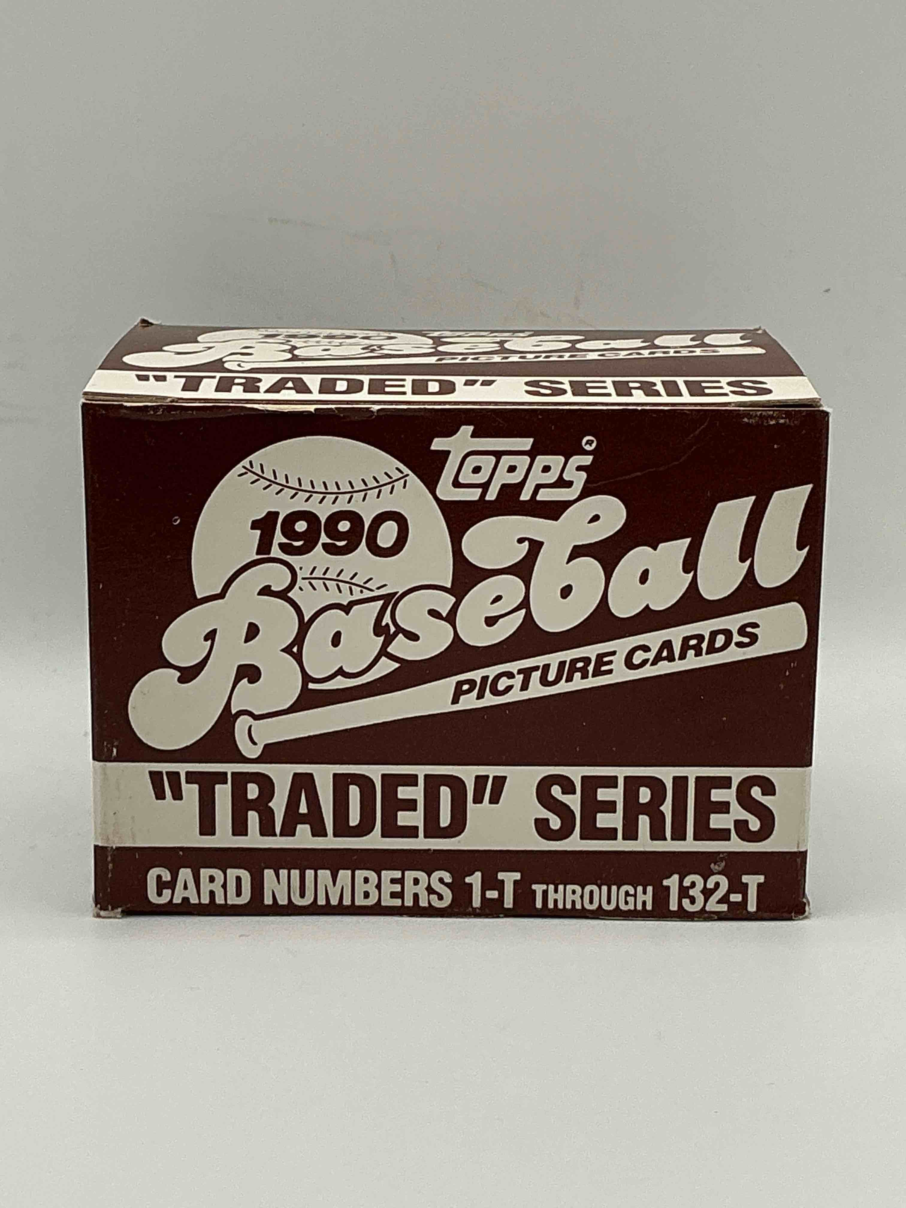 1990 Topps Baseball Card Complete Unopened Traded Series, Card Numbers 1-T Through 132-T. Set Is Unopened (These Sets Were Never Factory Sealed In Plastic From Manufacturer). Set Includes David Justice Traded Rookie. Great Sports Card Memorabilia!