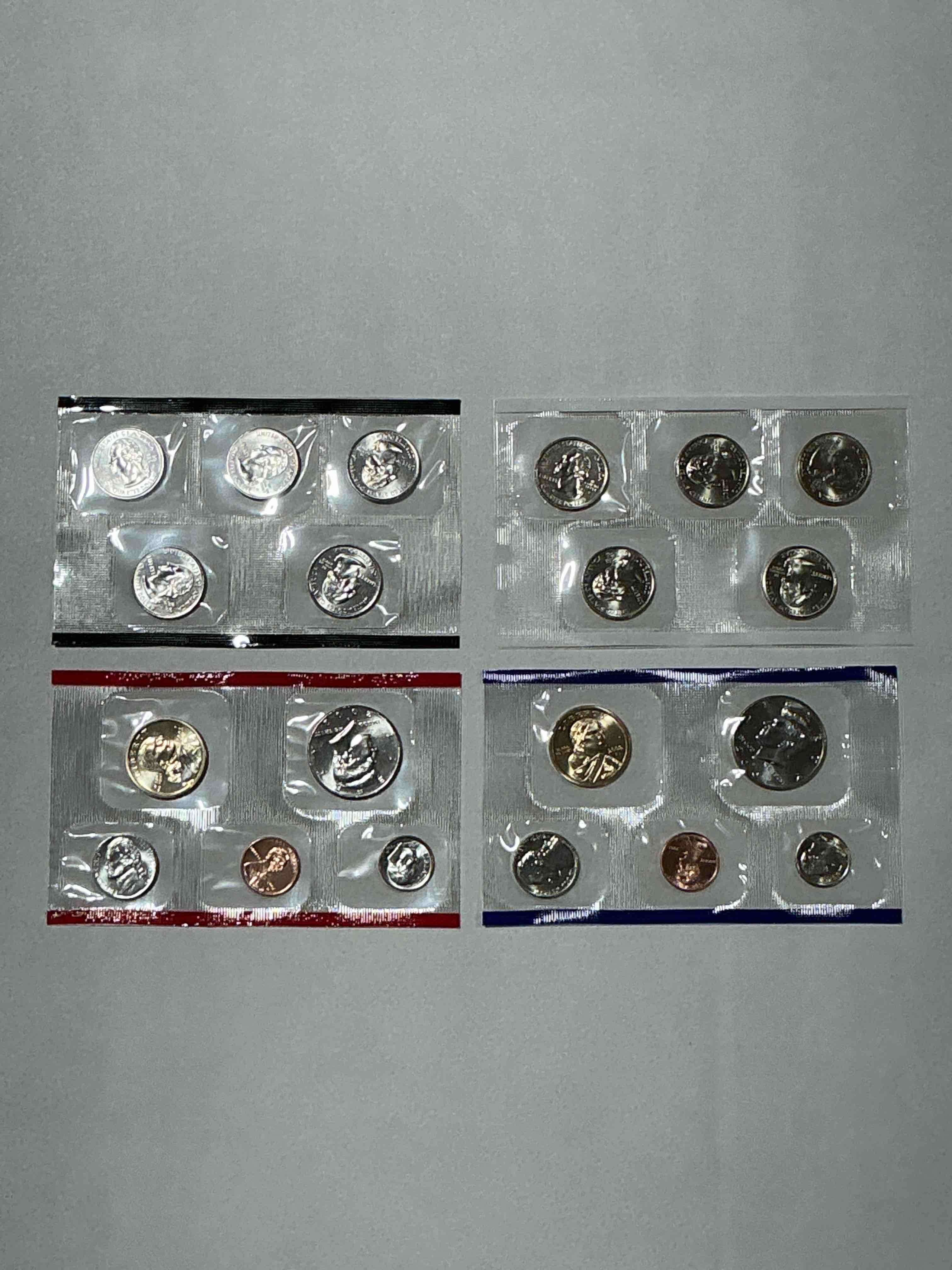 2002 uncirculated mint set! 20 coin mint set with ohio & indiana state quarters! half dollars, one dollar coins, quarters, nickels, dimes & pennies! 20 coin uncirculated mint set! 
