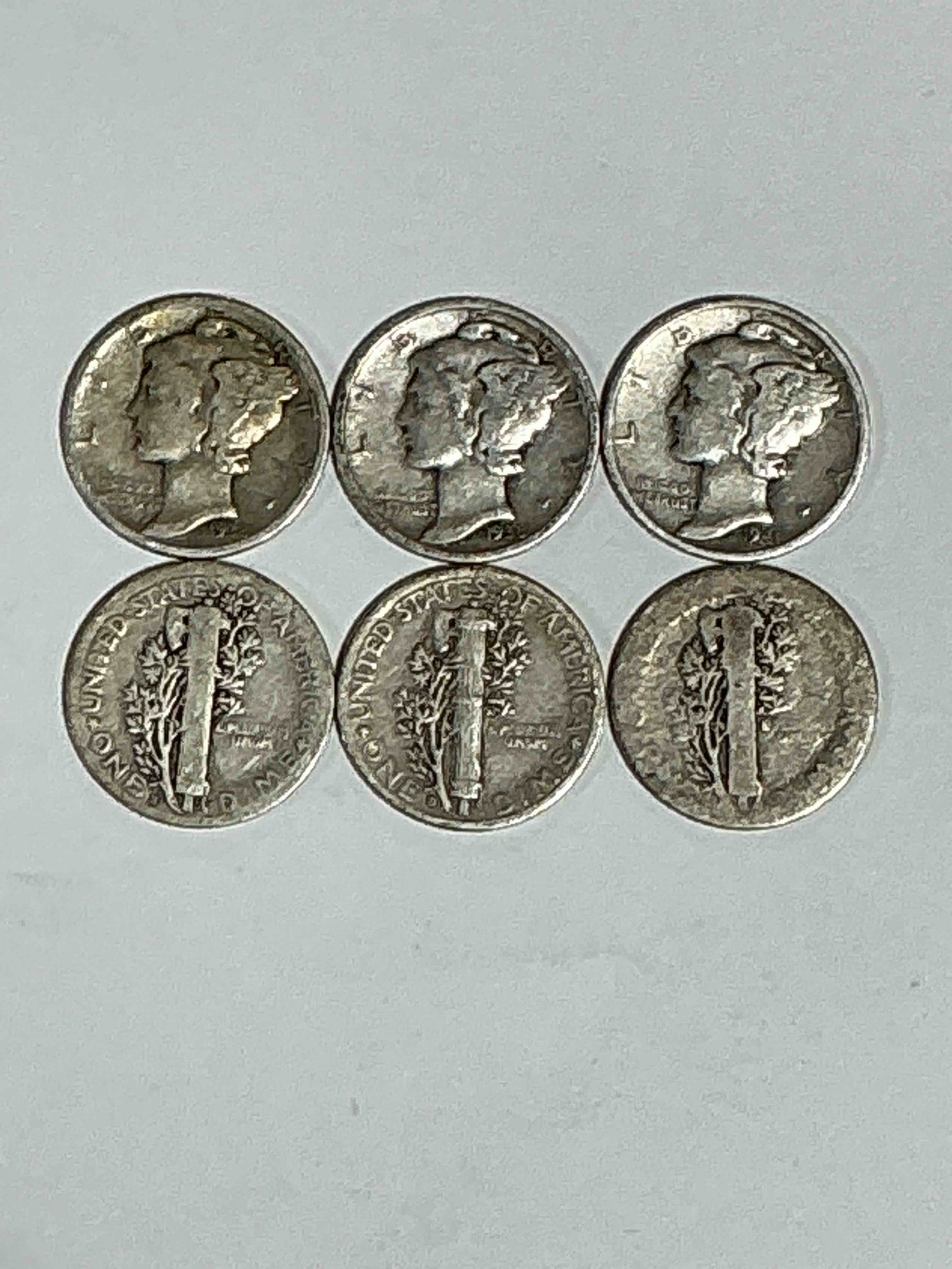 Antique U.S. Pure Fine Silver Mercury Dimes! Silver Mercury Dimes Were Minted From 1916-1945 & Have Become Serious Collector Items! Check Out These Awesome Examples, All In Nice, Circulated Condition With Visible Dates & Varying Years! Rare To Have Visible Dates! Makes For A Great Investment In Precious Metals, Mercury Dimes Are 90% Pure Fine Silver! They Don't Make Em' Like This Anymore!