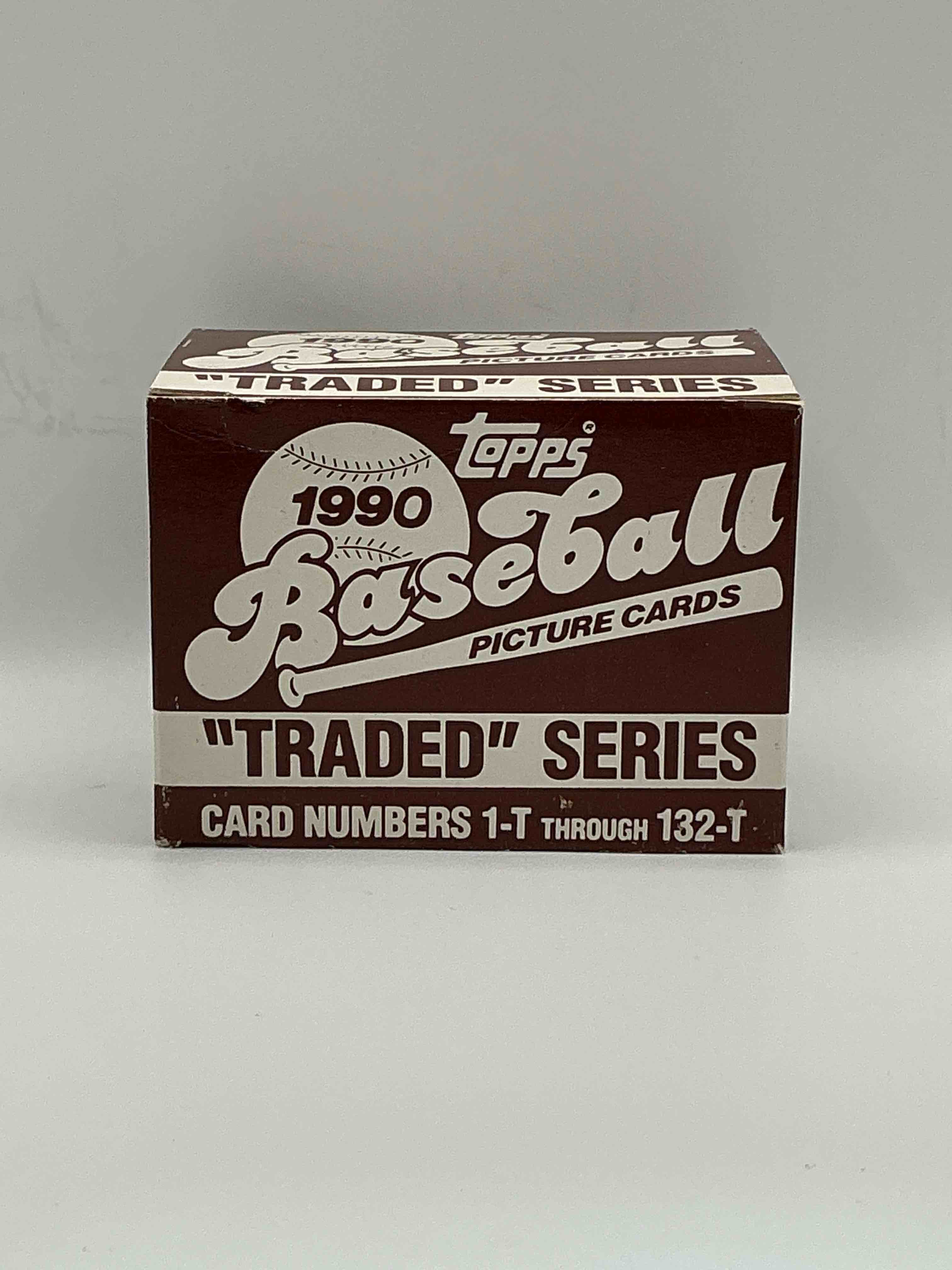 1990 Topps Baseball Card Complete Unopened Traded Series, Card Numbers 1-T Through 132-T. Set Is Unopened (These Sets Were Never Factory Sealed In Plastic From Manufacturer). Set Includes David Justice Traded Rookie. Great Sports Card Memorabilia!