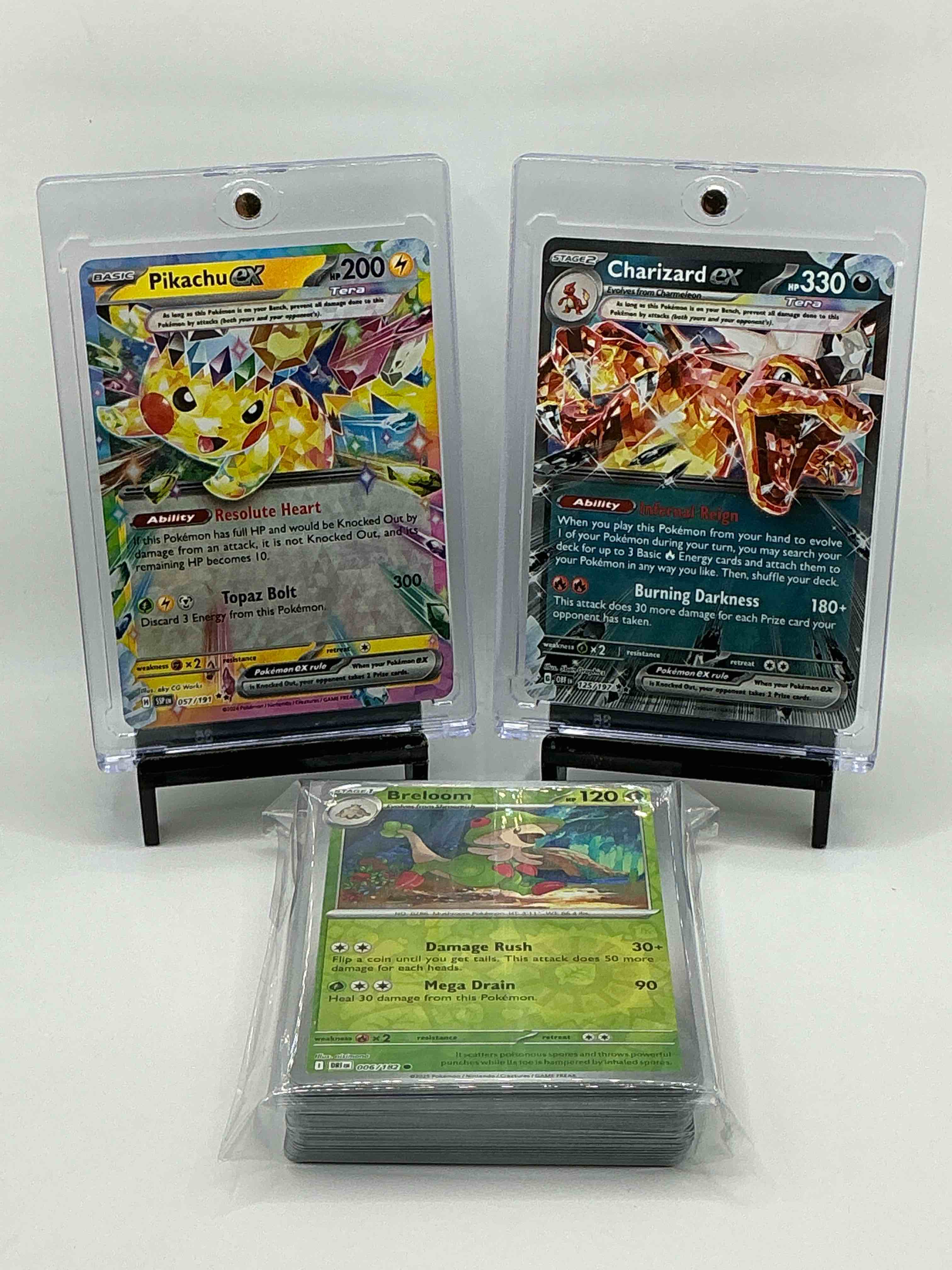 Yellow Rainbow Blast Holographic Resolute Heart Topaz Bolt Pikachu EX, Silver Holographic Infernal Reign Burning Darkness Charizard EX! Along With 50 Other Pokemon Heroes, Holos & Commons!