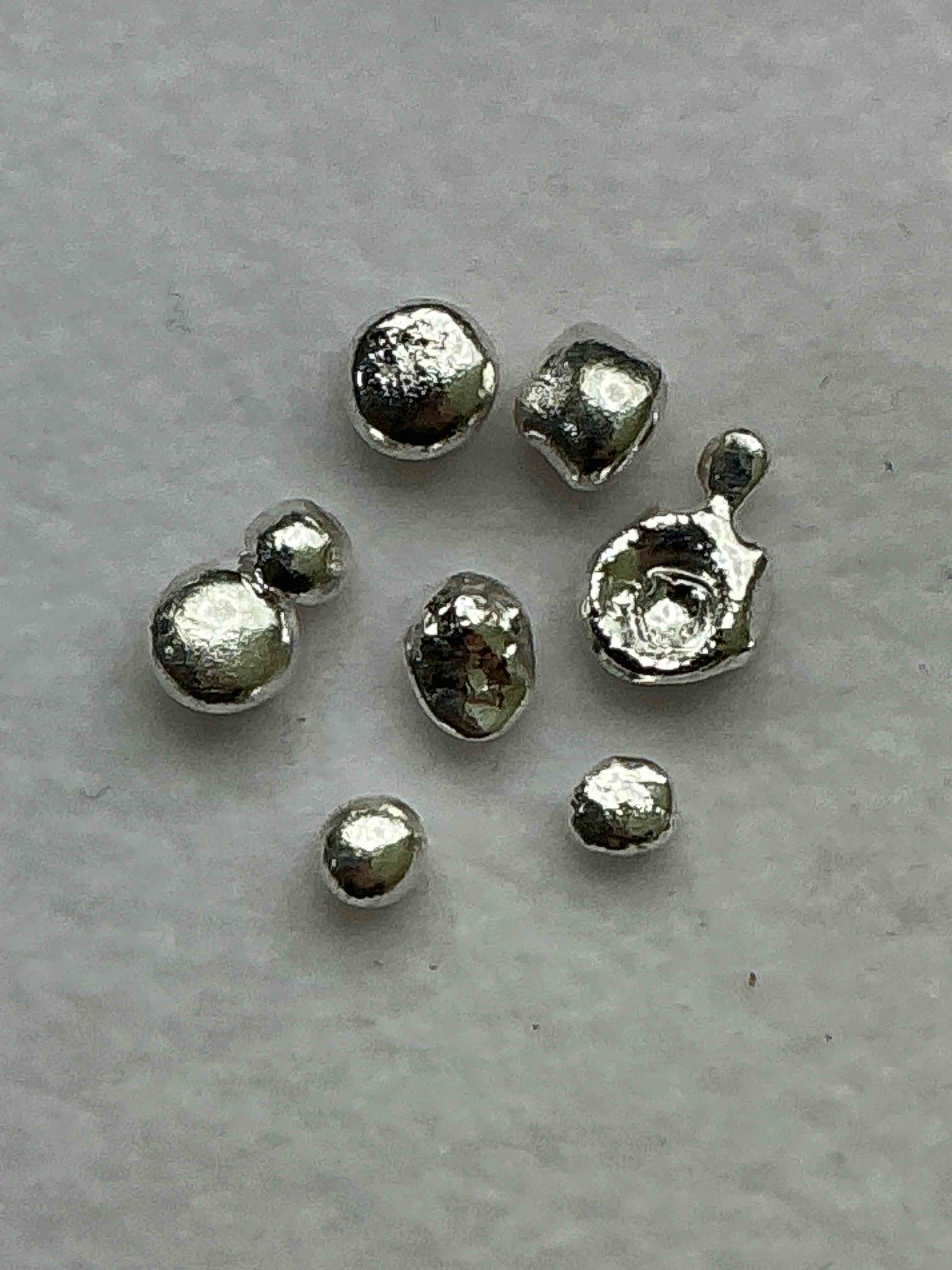 Silver Nuggets! .999 US Fine Silver, In Small Nugget Form! Total Weight Of All Nuggets In Lot Approximately 3 Grams, Bid Is Per Nugget! A Cool Way To Invest In Fine US Silver! Includes Collector Capsule!