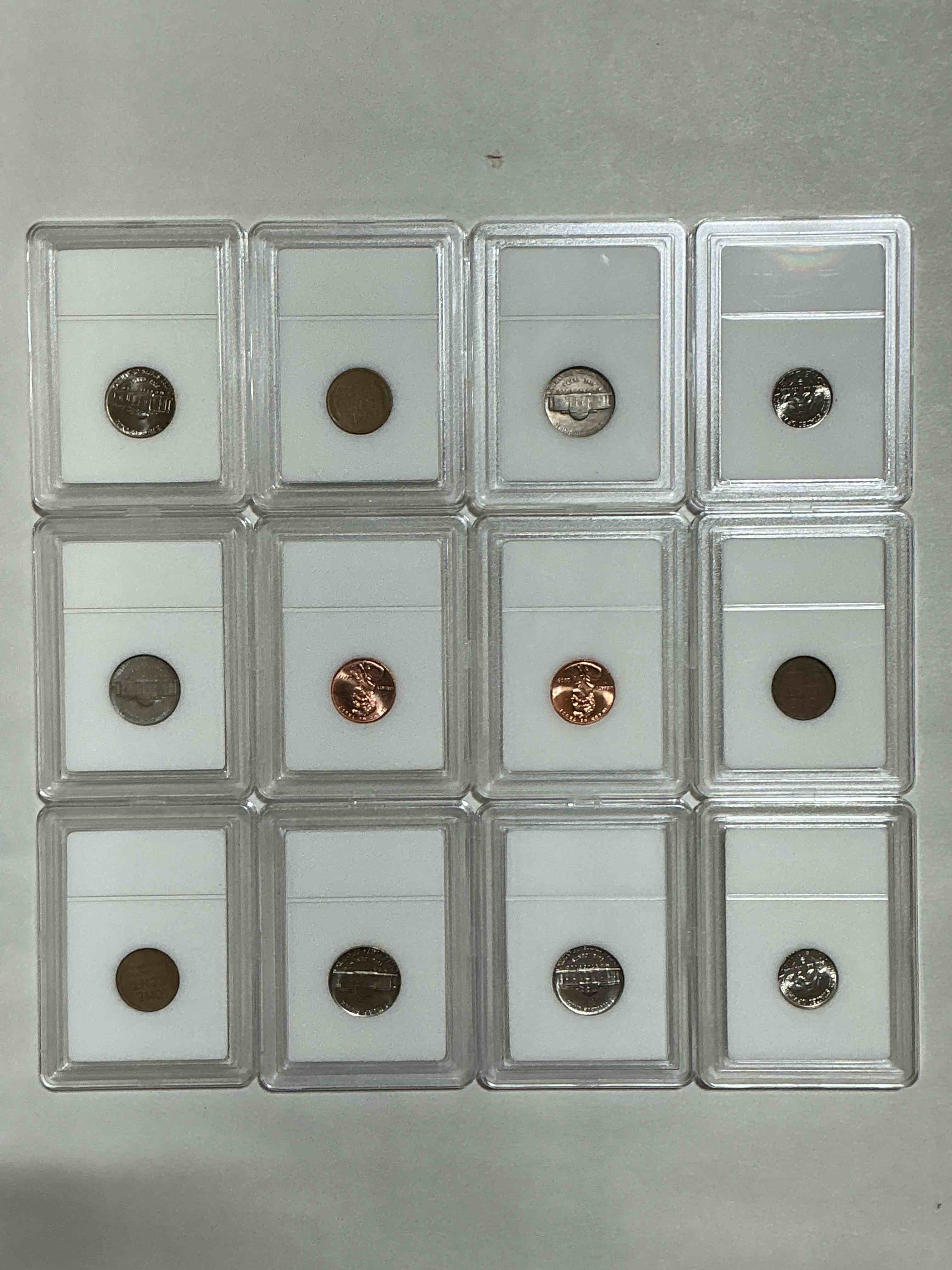 Condition photo showing New/Like New for Collector's Dream! 12 Different Rare, Slabbed U.S. Collector Coins In Certified/Catalogued Protective Slab Cases! A Great Way to Build An Incredible Collection Of Protected, Rare U.S. Coins! Great For The Coin Fan & Collector!
