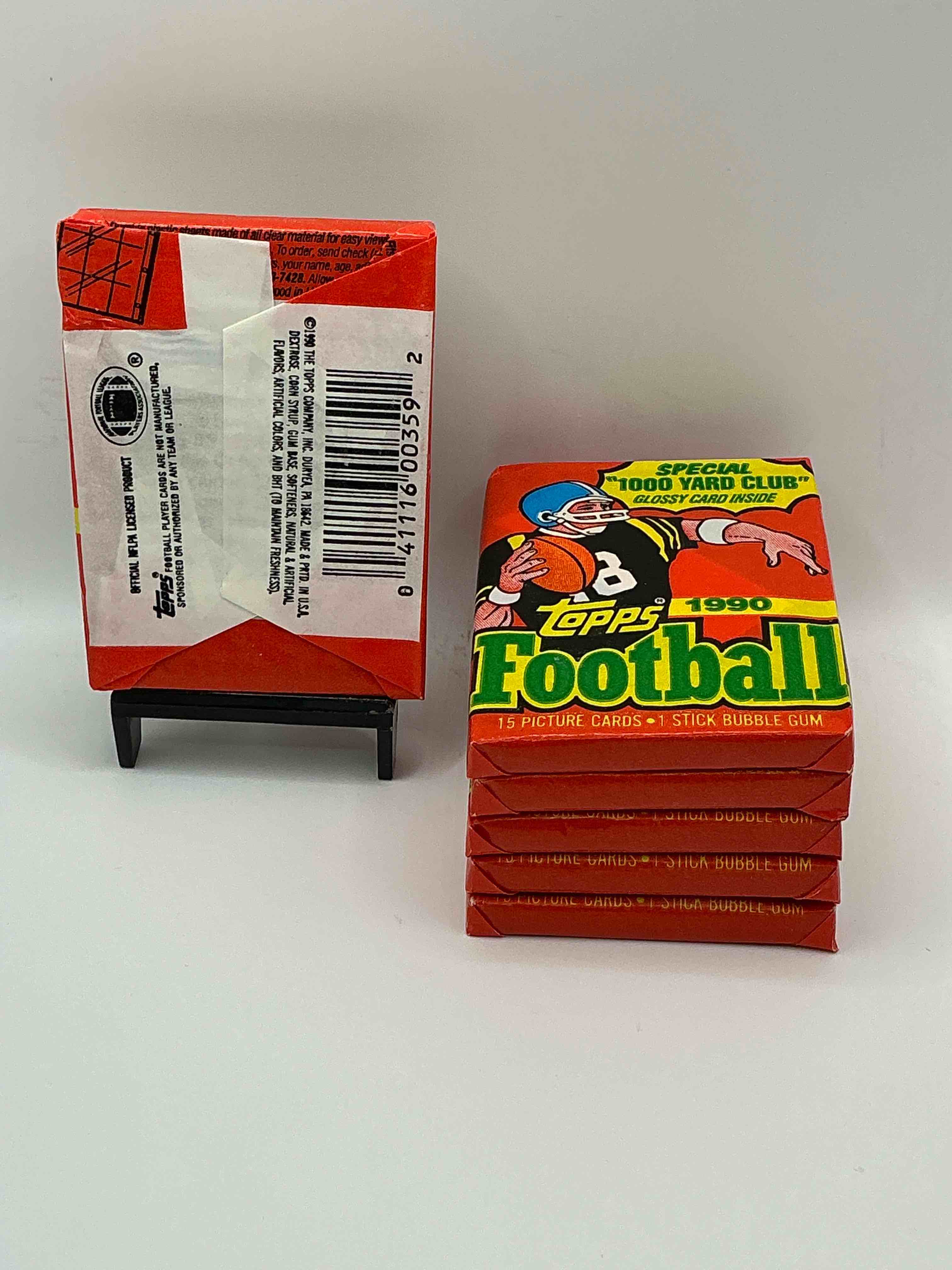 Condition photo showing New/Like New for The Last Year Of Football Wax! Joe Montana, Emmitt Smith & Barry Sanders!? 1990 Topps Football Unopened Sports Card Wax Pack, Direct From Original Retail Box! Getting Hard To Find! Search For Early Barry Sanders & Jerry Rice & So Much More!