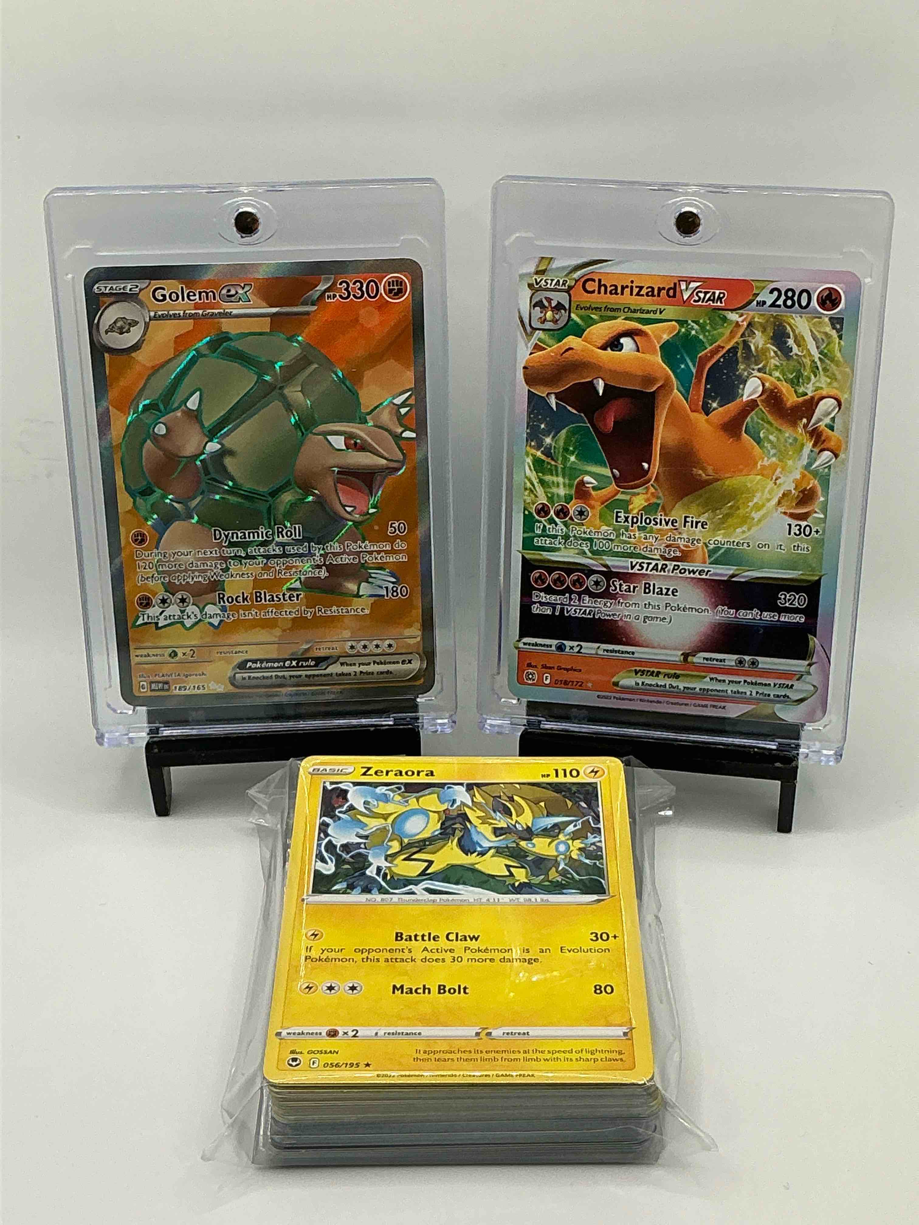 Pokémon Palooza! Orange And Silver Explosion Holographic Dynamic Roll Rock Blaster Golem EX! Green And Orange Wave Holographic Explosive Fire Star Blaze Charizard Vstar! Along 50 Other Pokemon Heroes, Holos, Legends & Commons!