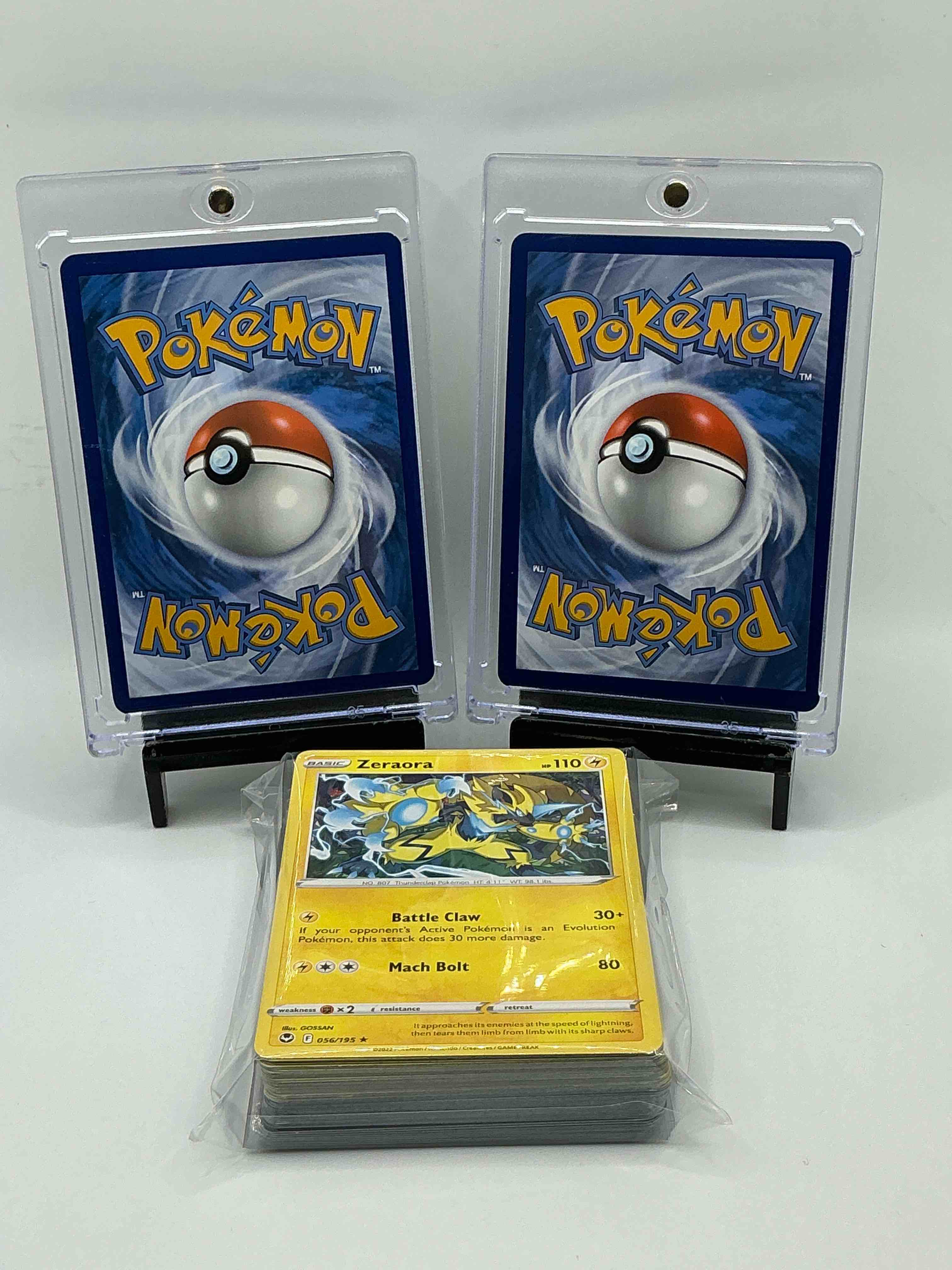 Condition photo showing New/Like New for Pokémon Palooza! Orange And Silver Explosion Holographic Dynamic Roll Rock Blaster Golem EX! Green And Orange Wave Holographic Explosive Fire Star Blaze Charizard Vstar! Along 50 Other Pokemon Heroes, Holos, Legends & Commons!