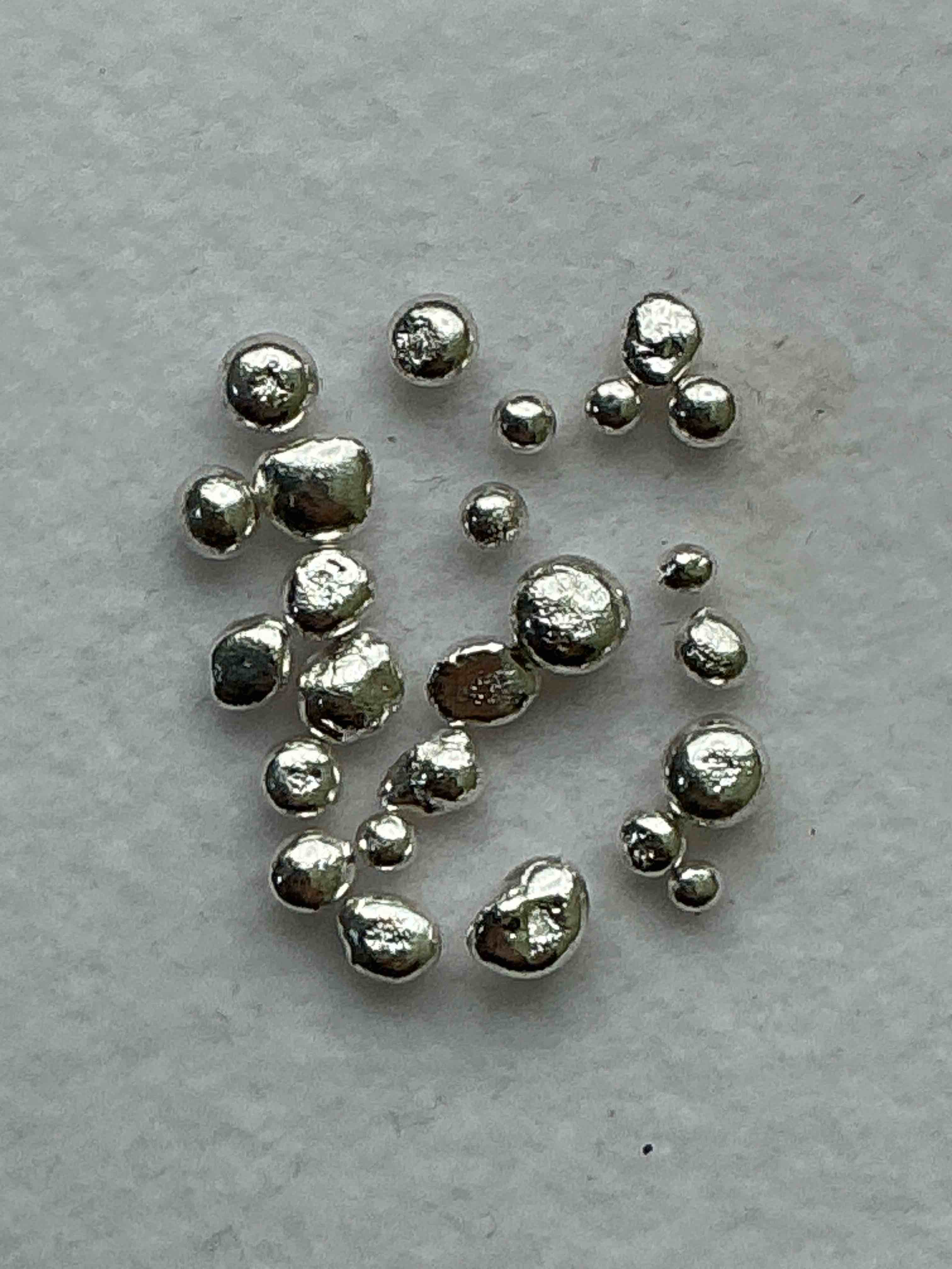 Silver Nuggets! .999 US Fine Silver, In Small Nugget Form! Total Weight Of All Nuggets In Lot Approximately 3 Grams, Bid Is Per Nugget! A Cool Way To Invest In Fine US Silver! Includes Collector Capsule!