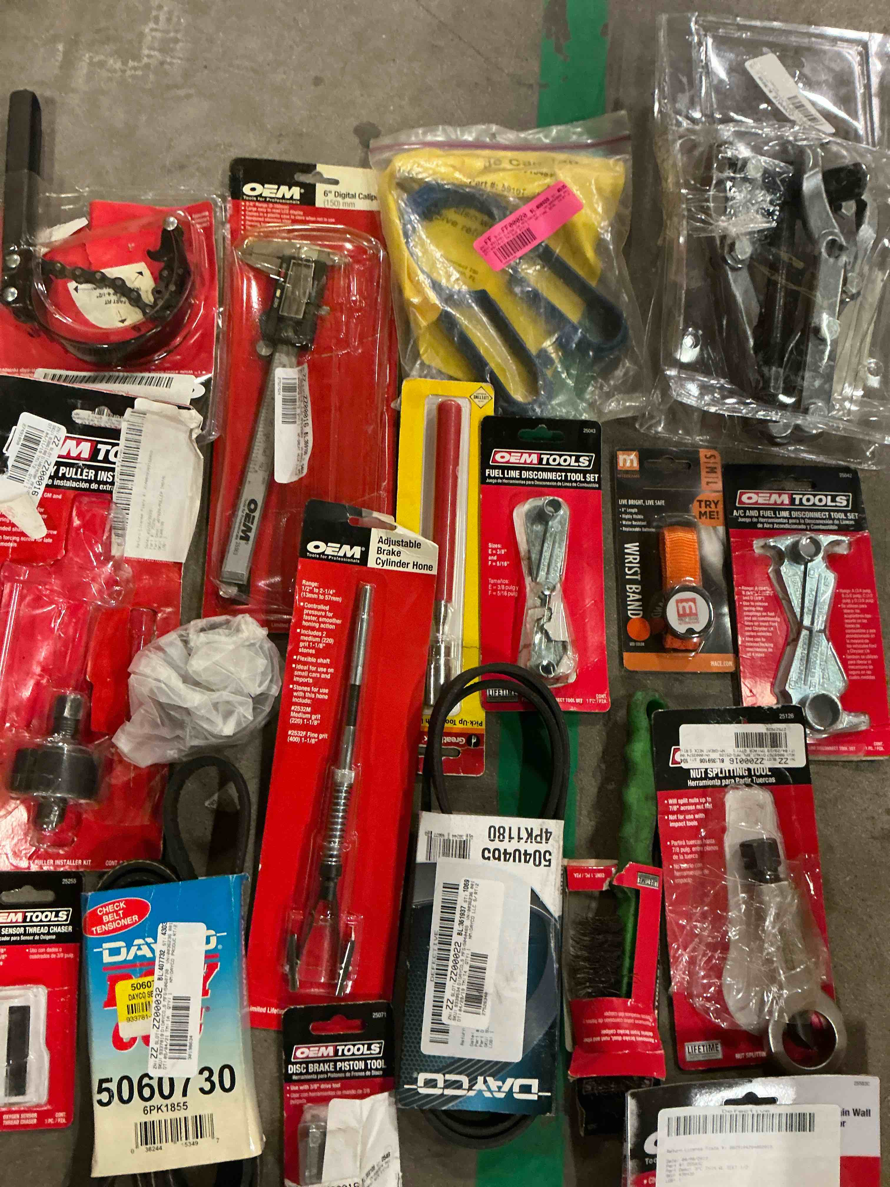 Assorted of car parts. OEM Tools/ Dayco and more 