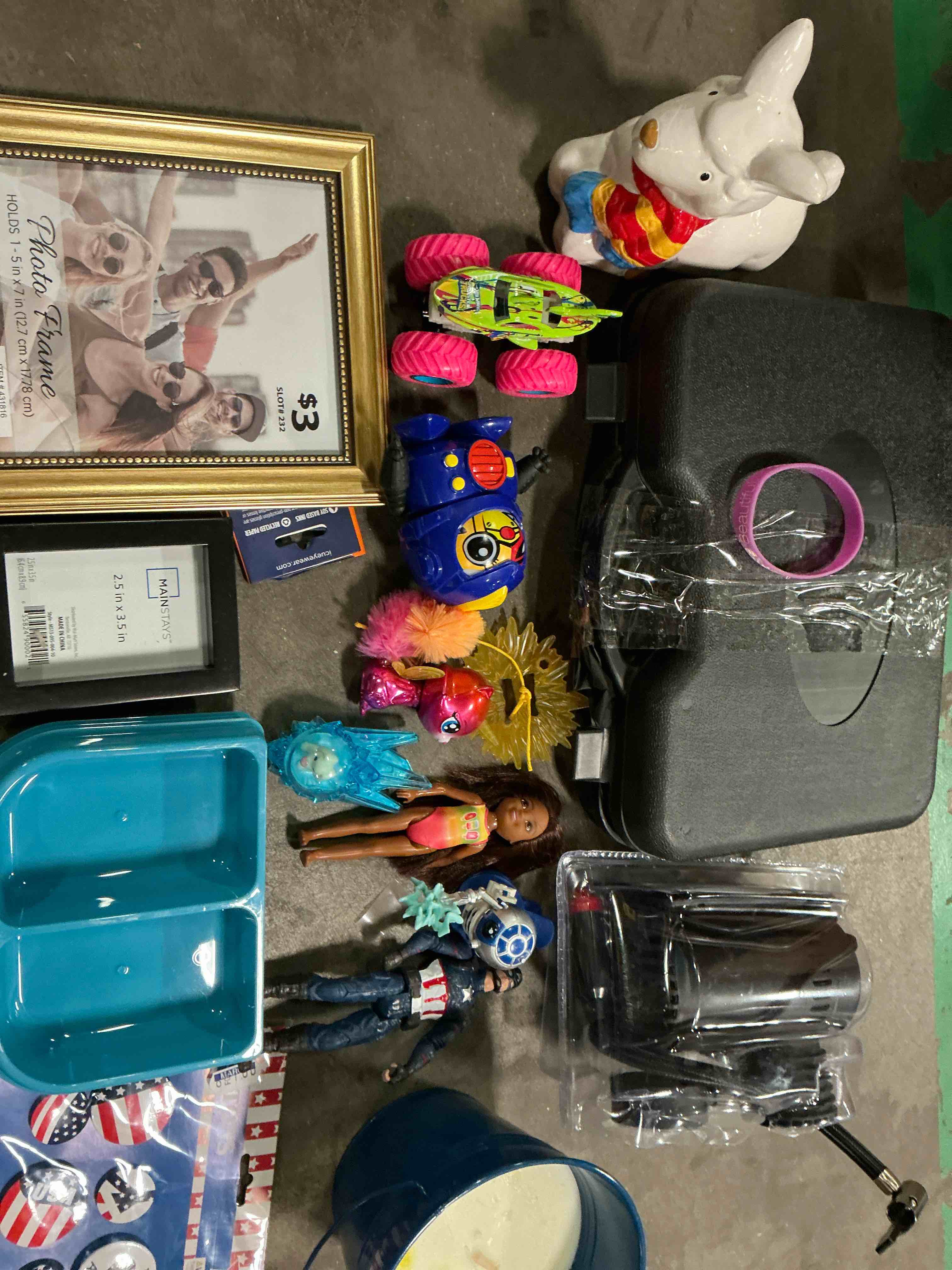 Assortment of variety of items includes candle toys and mo