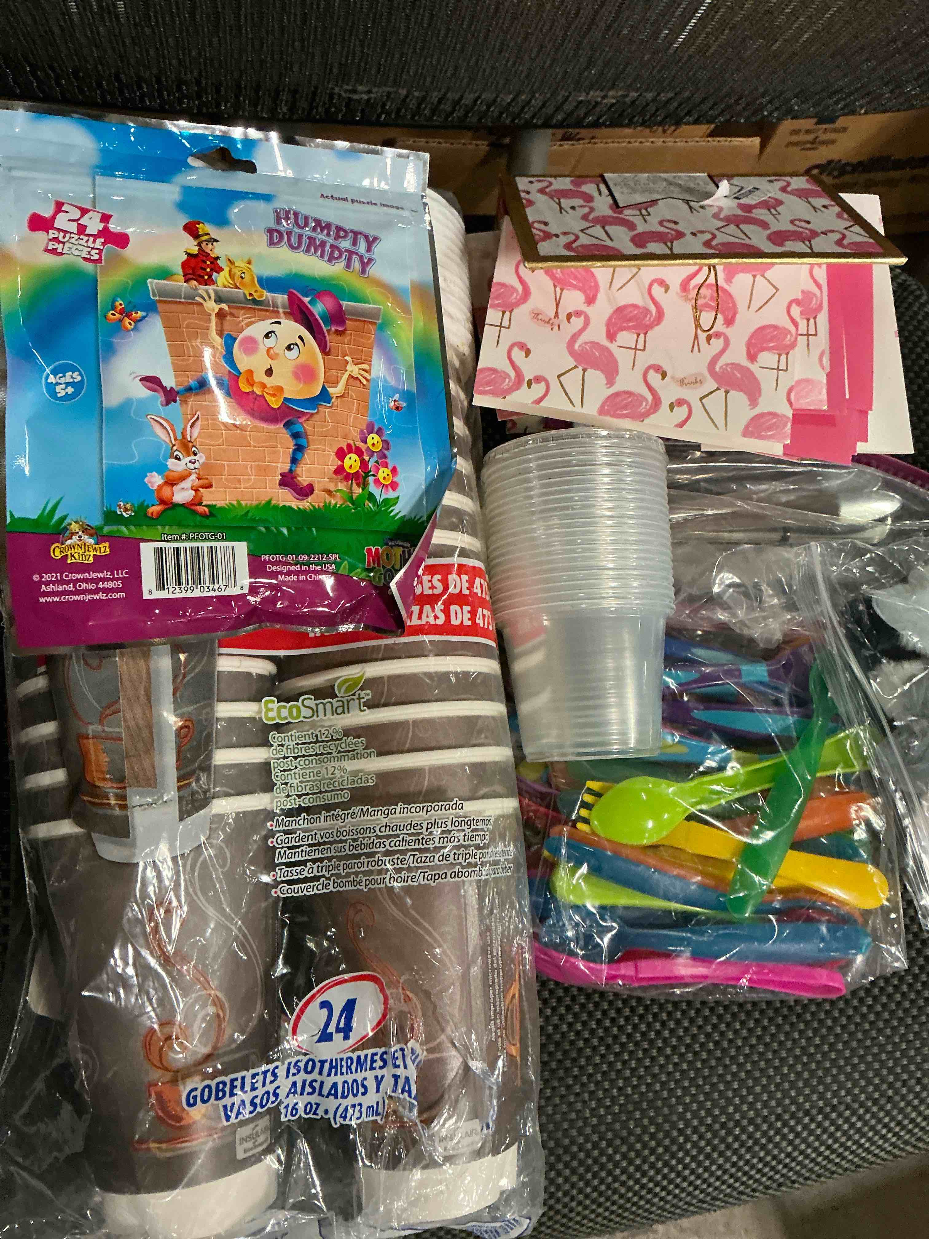 Assortment of household products includes. Spoon forks glasses and more